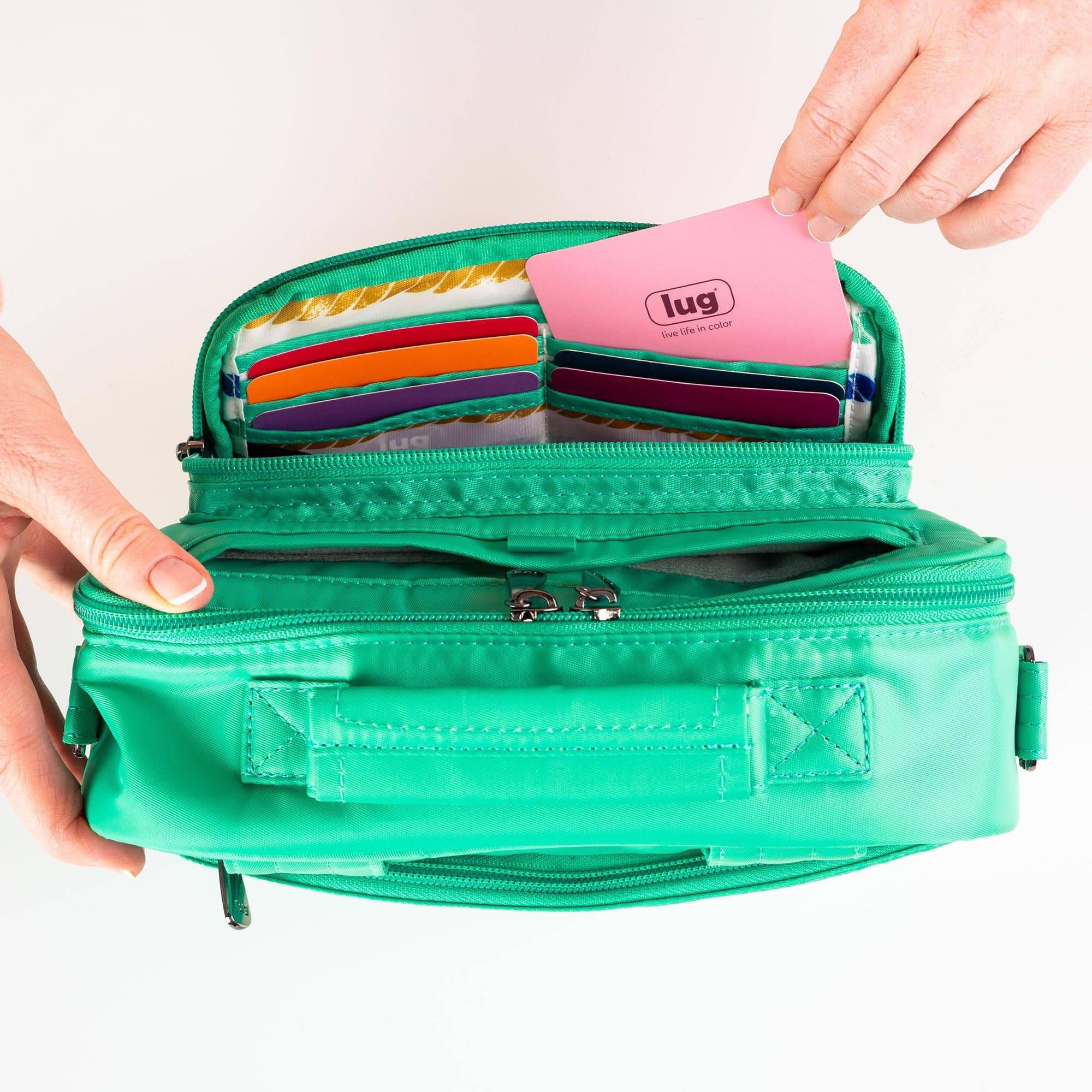 Legacy Collection Carousel Crossbody Bag - - 24199_LegacyCarousel_OasisTeal_Lifestyle_02