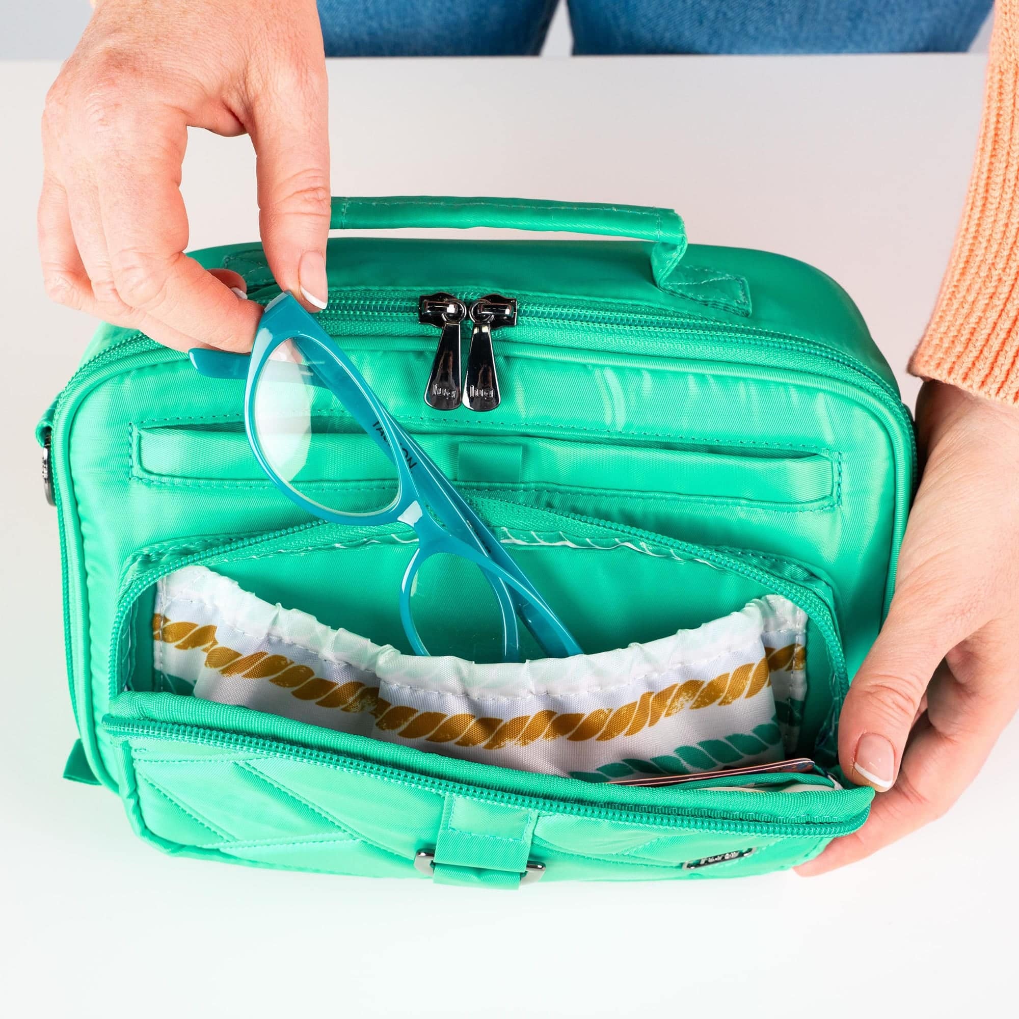 Legacy Collection Carousel Crossbody Bag - - 24199_LegacyCarousel_OasisTeal_Lifestyle_03