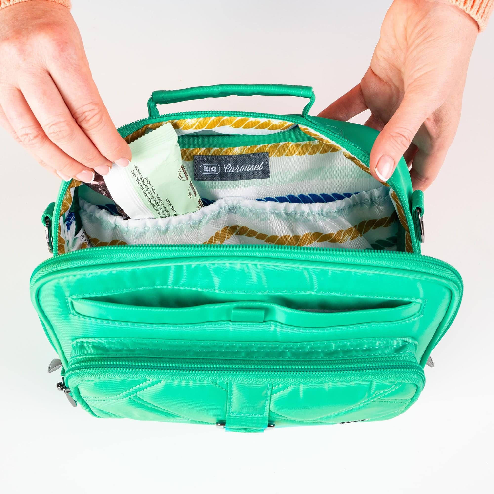 Legacy Collection Carousel Crossbody Bag - - 24199_LegacyCarousel_OasisTeal_Lifestyle_04