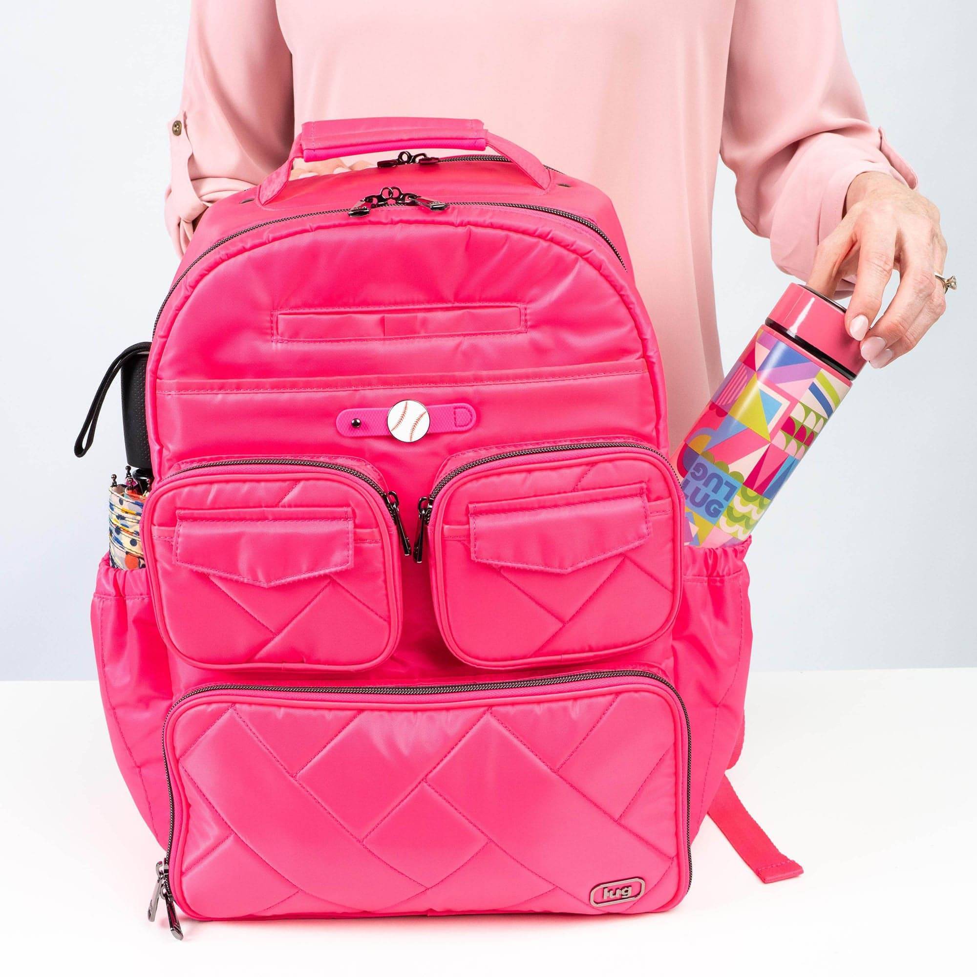 Legacy Collection Puddle Jumper Backpack - - 24353_LegacyPuddleJumperBackpack_Magenta_Lifestyle_01