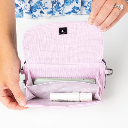 Vault Matte Luxe VL RFID Convertible Crossbody - - 24569_VaultMatteLuxe_MetallicBubblePurple_Lifestyle_01