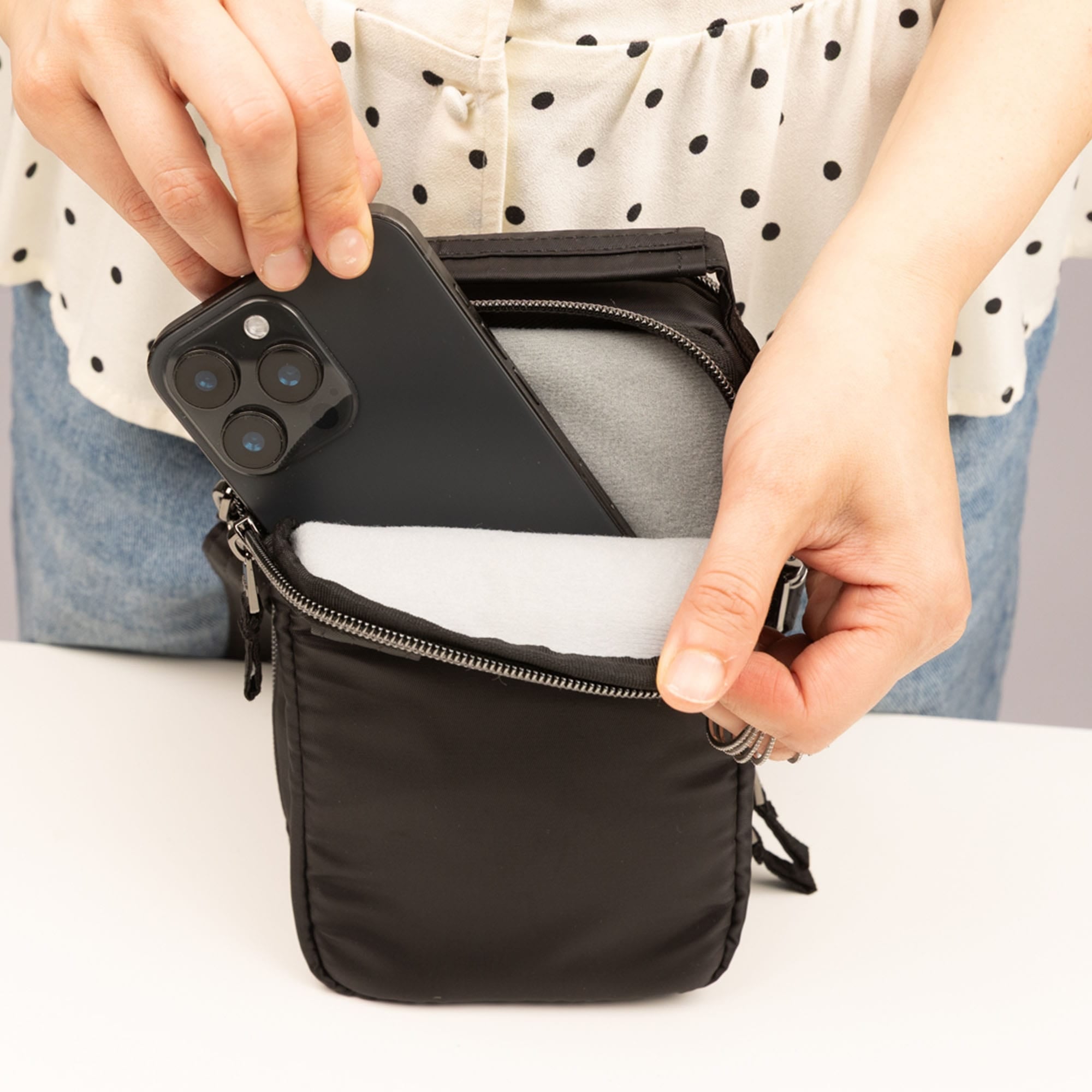 Skeeter Mini Bridge Crossbody Bag with Puller - - 24740_SkeeterMiniBridge_Black_Lifestyle_05