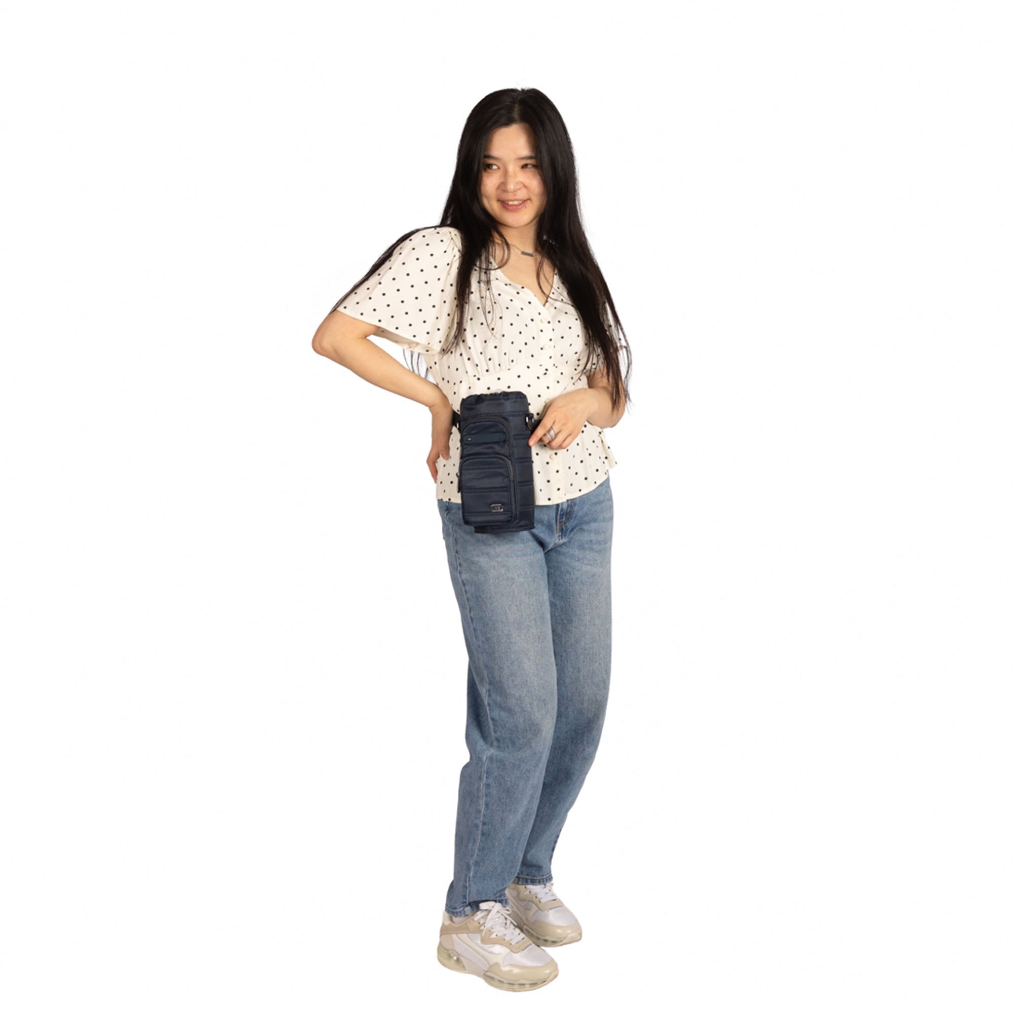 Indigo Lug Huggie Wide Crossbody Water Bottle Holder with charm bar, adjustable strap and durable water-resistant fabric.