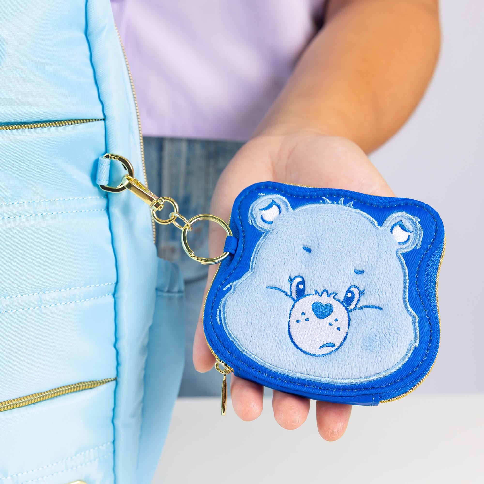 Care Bears x Lug Coin Pouch - - 24783_LugxCareBears_CoinPouch_GrumpyBear_Lifestyle_02