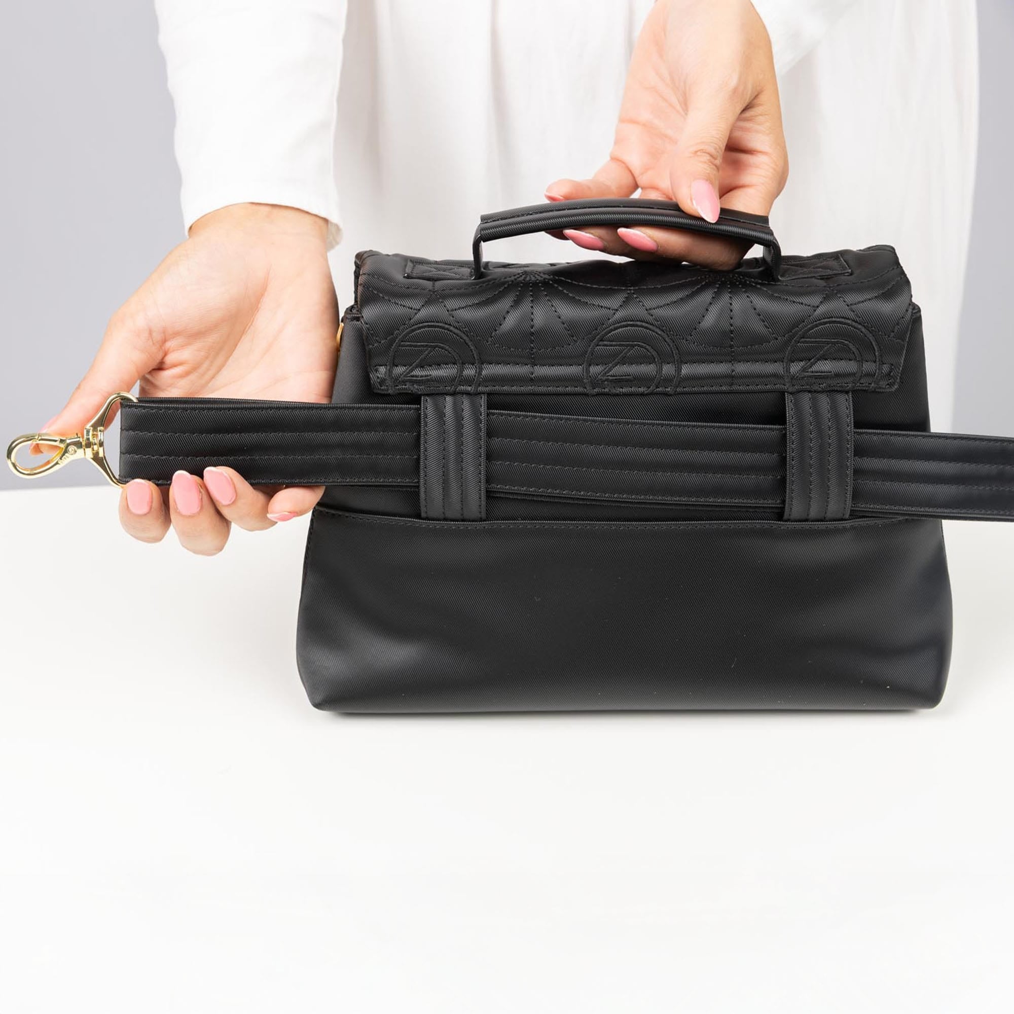 Wicked x Lug Plié Satin Luxe VL Crossbody Bag - - 25293_Wicked_PlieSatinLuxe_Black_Lifestyle_06