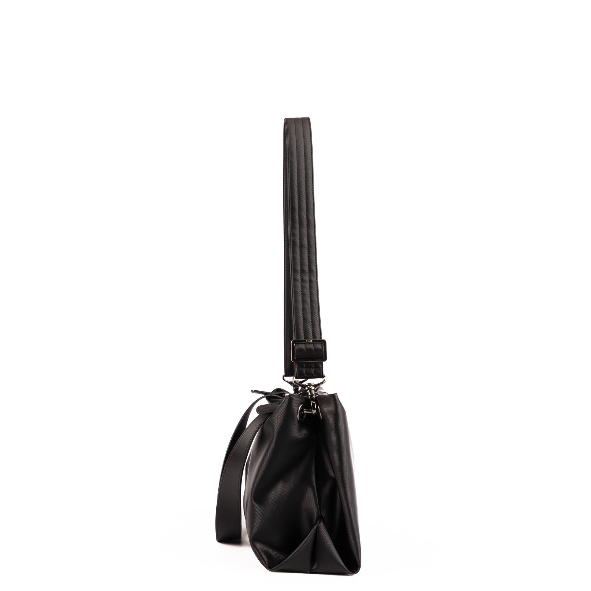 Lug Half Plunge Satin Luxe VL Crossbody Bag in black, featuring sleek satin material and stylish crossbody strap.