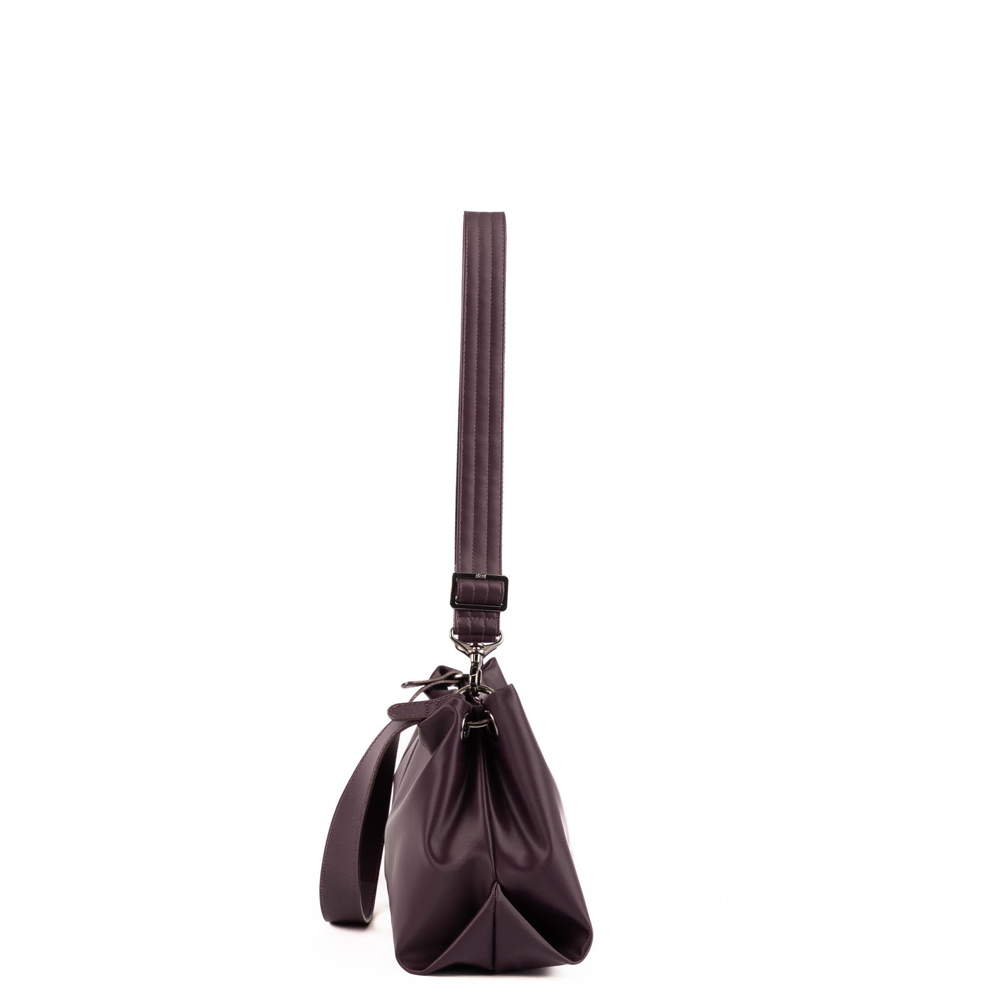 Lug Half Plunge Satin Luxe VL Crossbody Bag in plum, showcasing sleek design and adjustable strap from a side angle.
