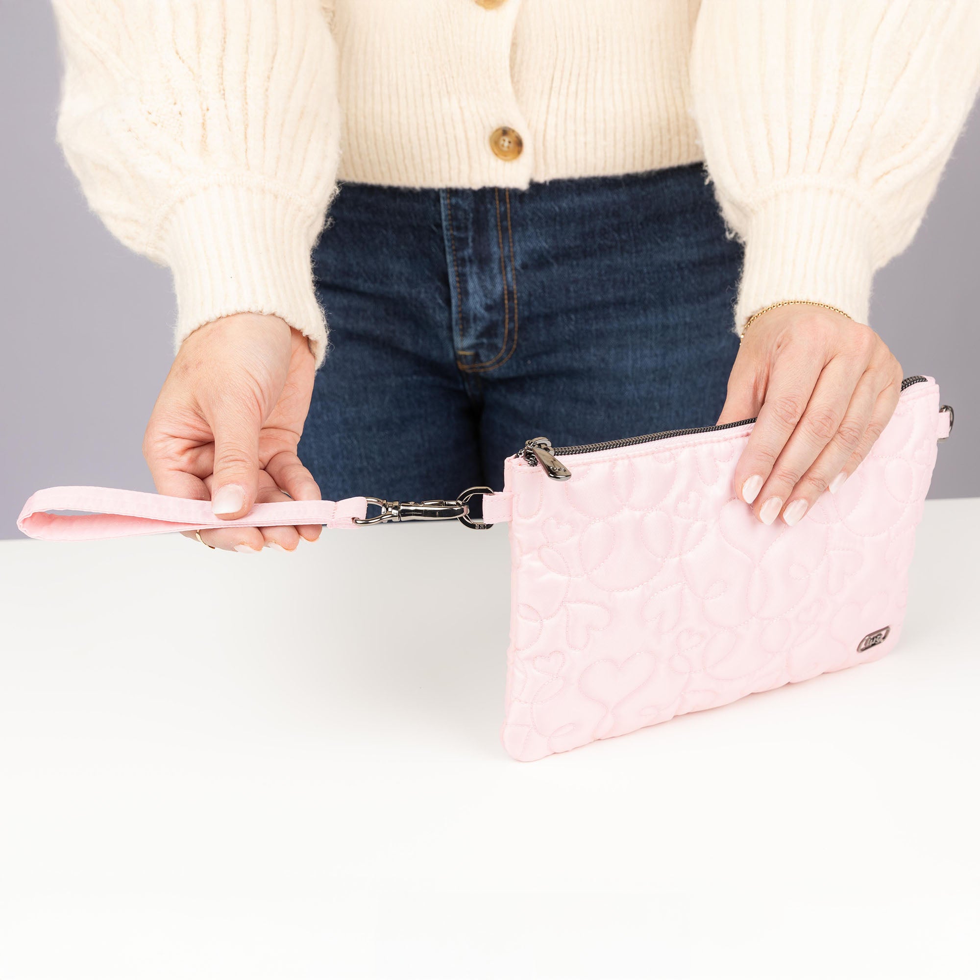 Ziplet Wristlet RFID Wallet - - 25610_Ziplet_BubblePinkSwirlyHearts_Lifestyle_01