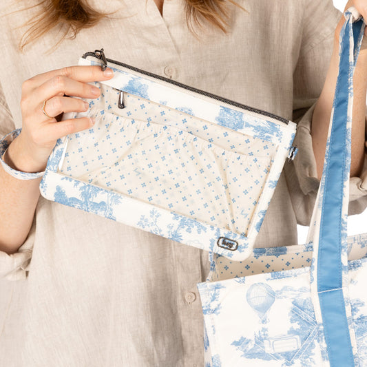 Longboat LE Carry-All with Pouch - - 26017_LongboatLE_20_2PC_StorybookBlue_BodyProportions_03