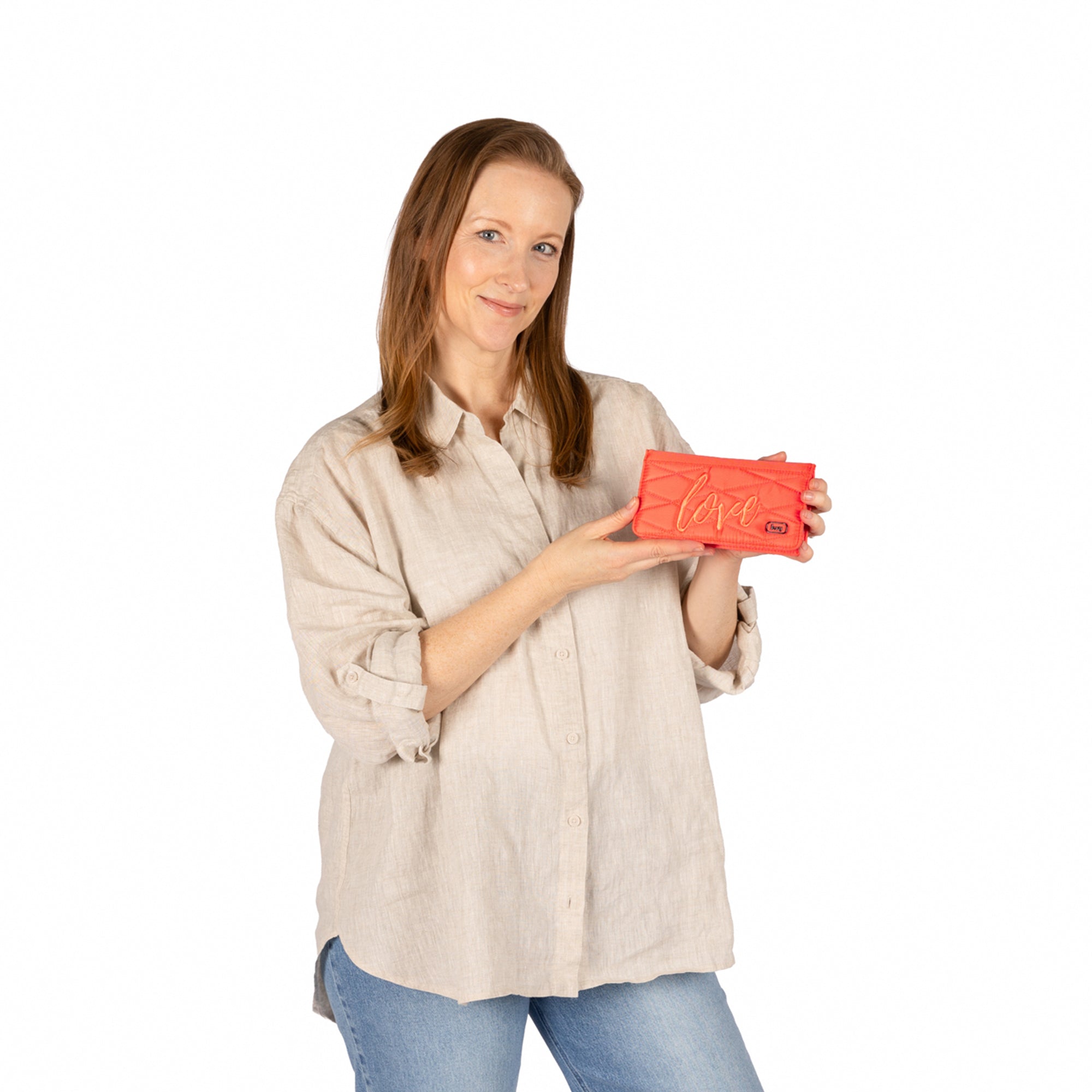 Sweep Slim Flap Wallet - - 26052_Sweep_PinkGrapefruit_Lifestyle_1