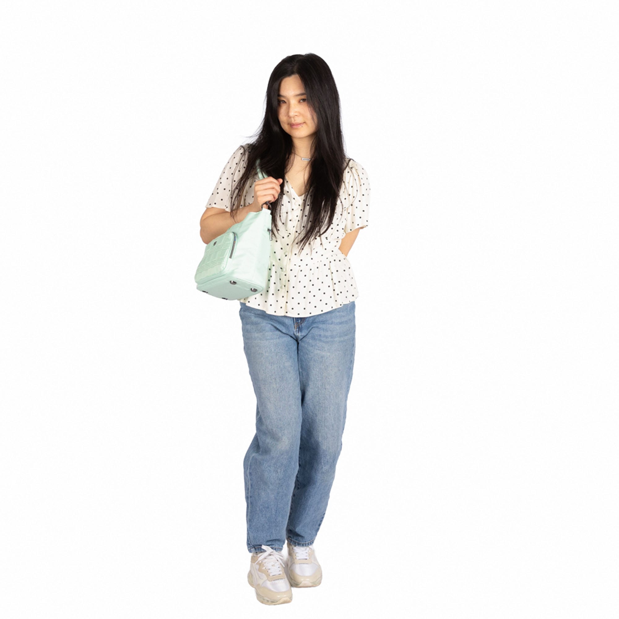 Lug Samba 2 convertible crossbody bag in Mist Green with adjustable strap and multiple compartments.