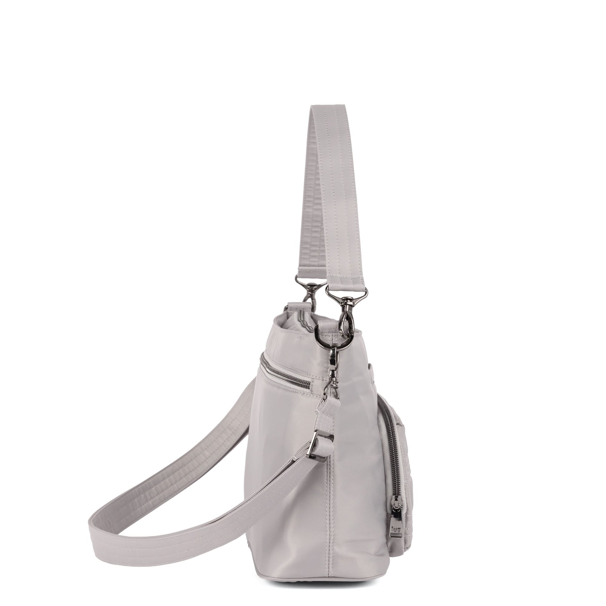 Lug Samba 2 Convertible Crossbody Bag in Grey Cloud, showing multiple angles with adjustable strap and compact design.