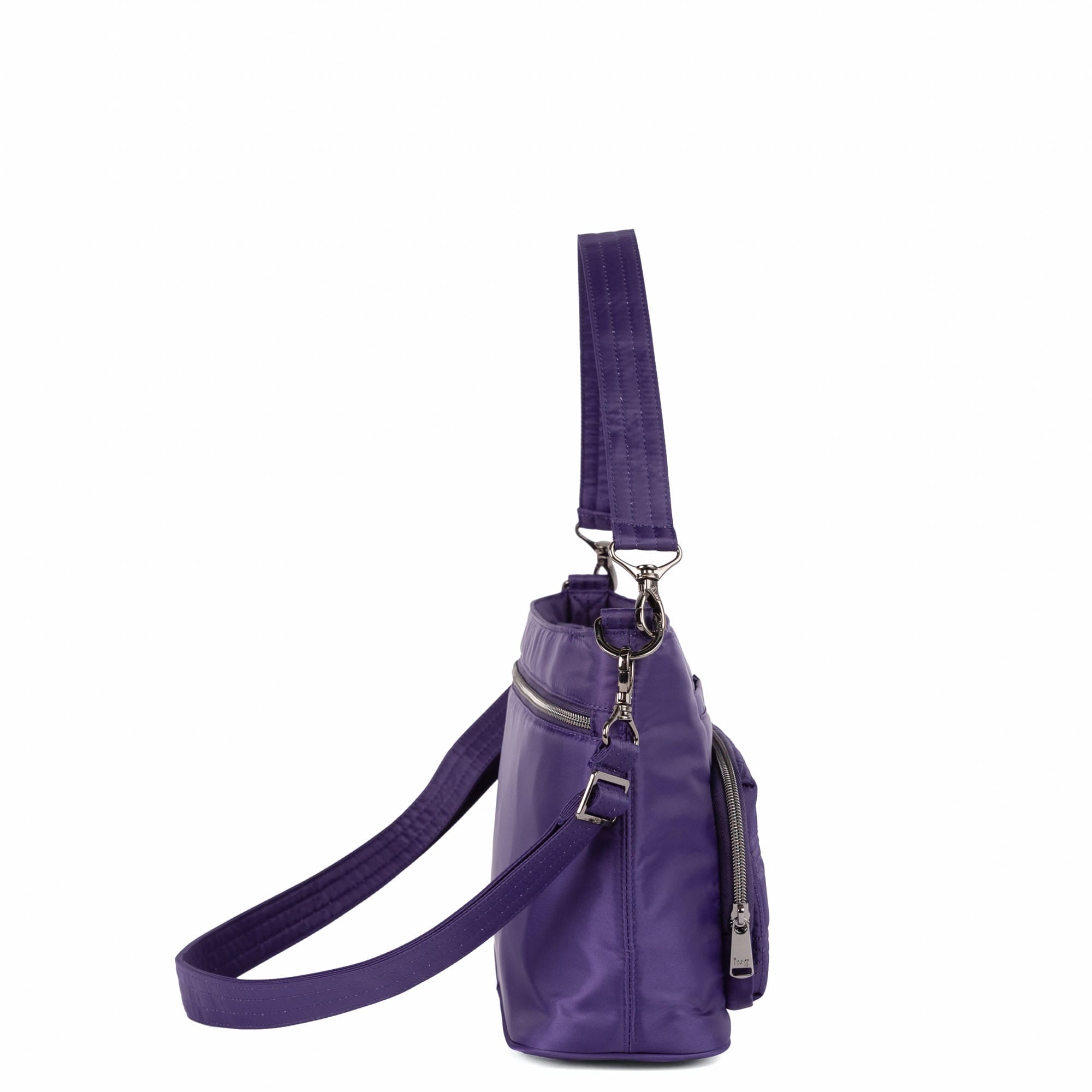 Lug Samba 2 Convertible Crossbody Bag in Concord Purple, shown from an angled view highlighting its compact design and adjustable strap.