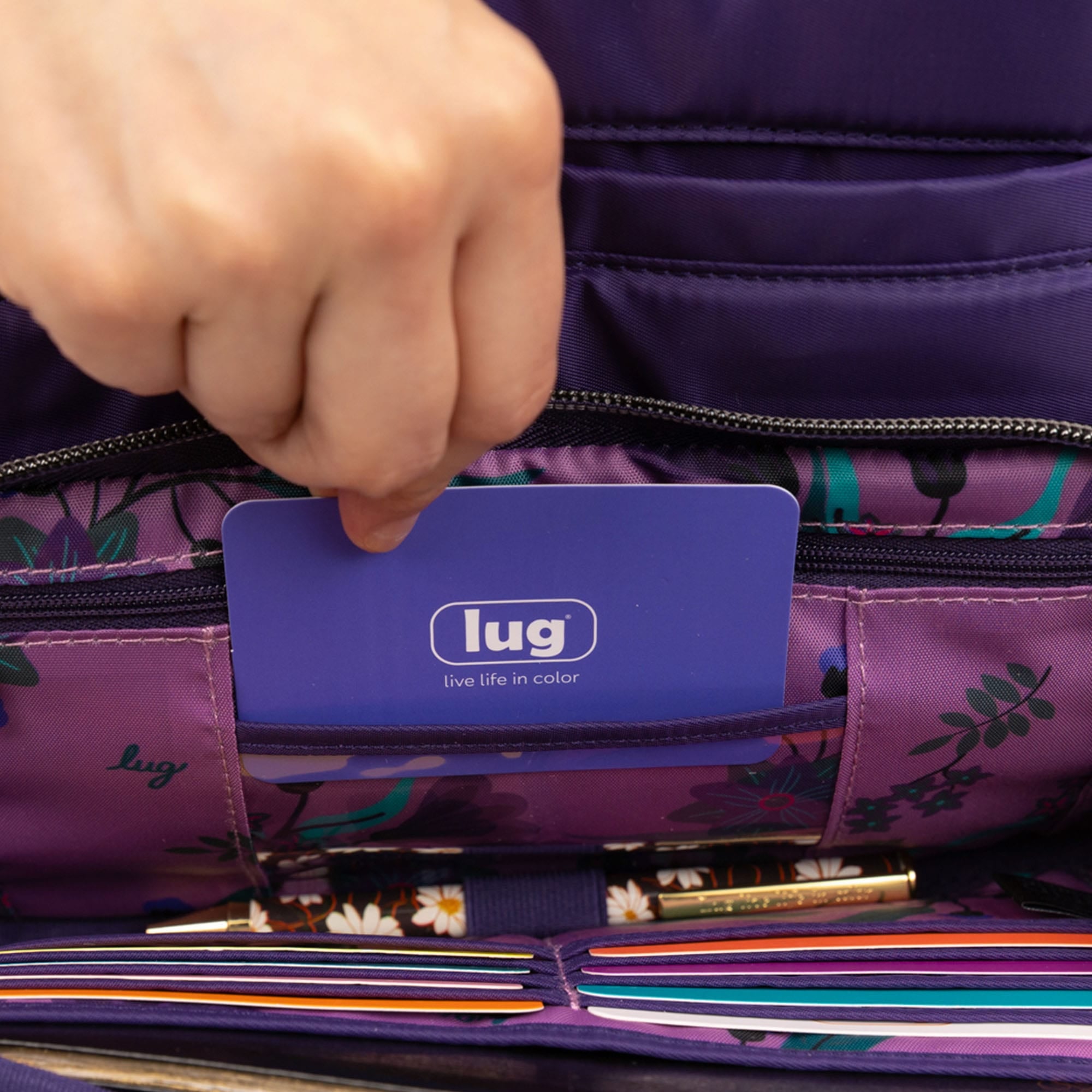 Lug Samba 2 Convertible Crossbody Bag in Concord Purple, shown in lifestyle setting with adjustable strap and compact design.