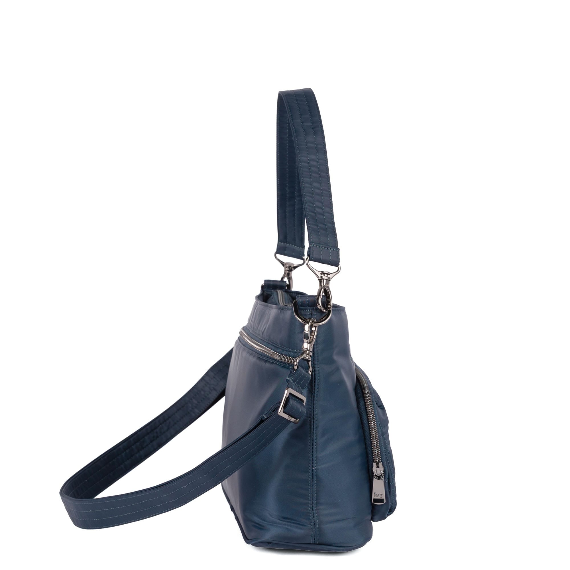 Lug Samba 2 Indigo convertible crossbody bag with adjustable strap and multiple compartments, shown from an angled view.