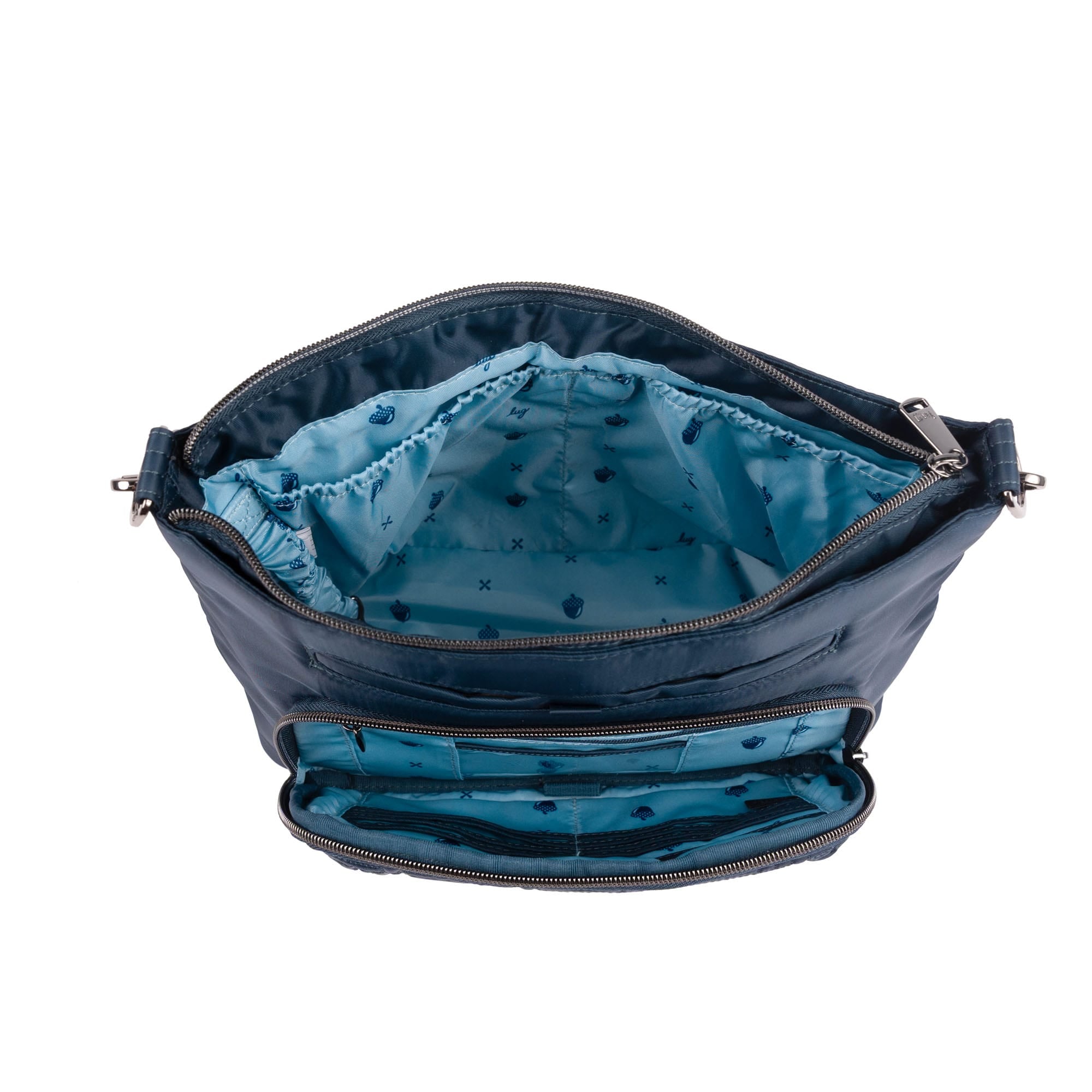 Lug Samba 2 convertible crossbody bag in indigo, showcasing its sleek design and adjustable strap from an angled view.