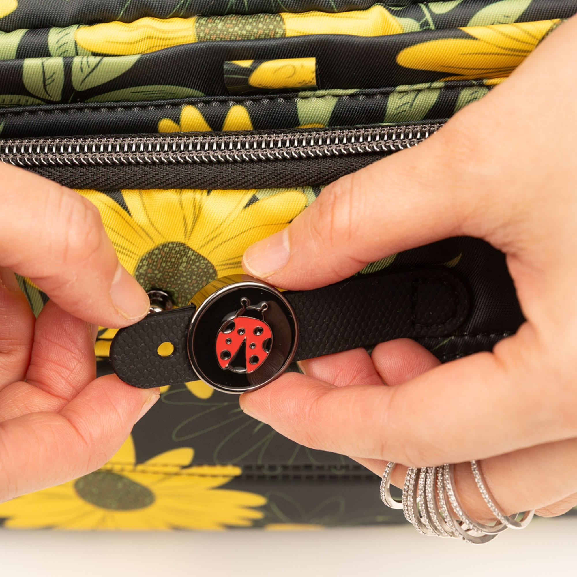 Trolley 3 Crossbody Bag - - 26174_Trolley3_SunflowersBlack_Lifestyle_01