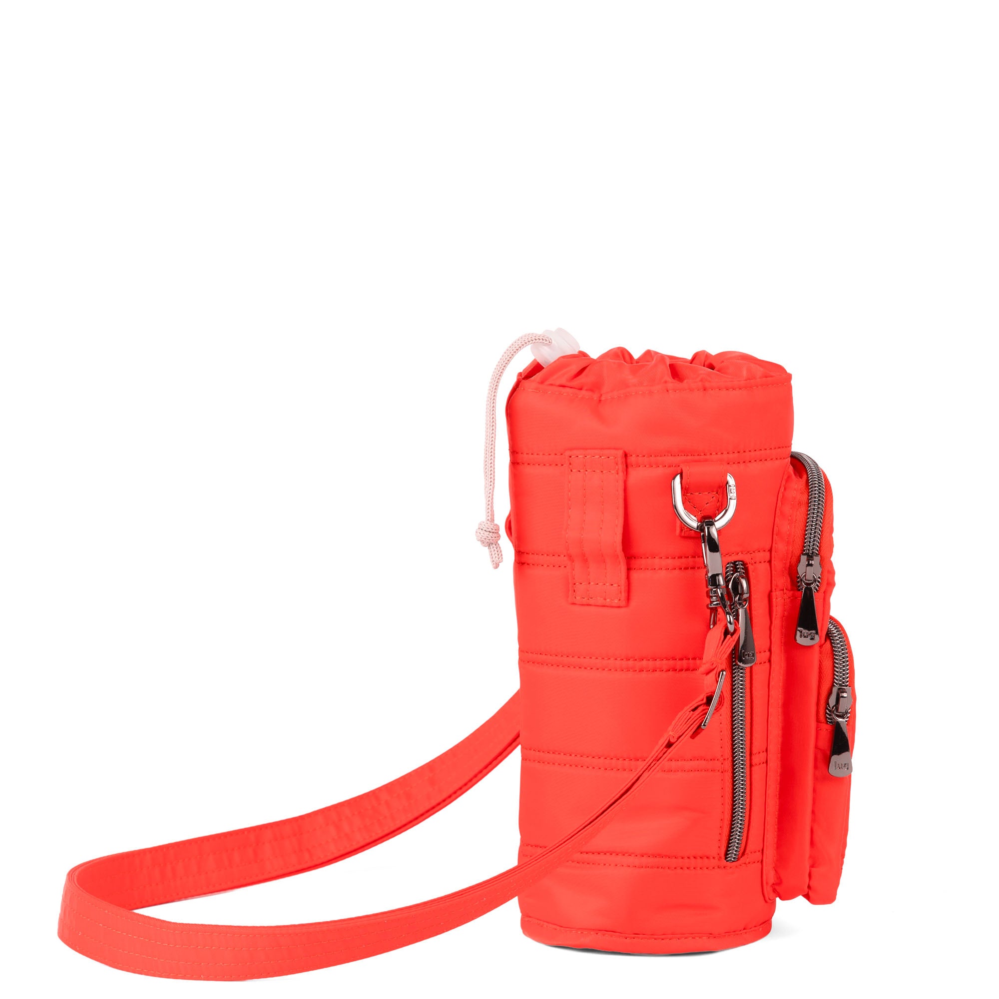 Lug Huggie wide crossbody water bottle holder in cayenne red with charm bar, showing adjustable strap and water bottle compartment.