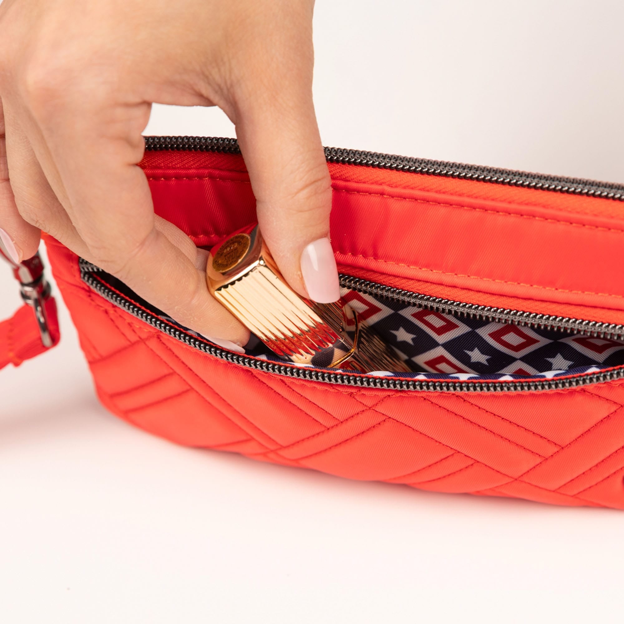 Super Metro XL Wristlet with Charm Bar - - 26262_SuperMetroXL_CayenneRed_Lifestyle_02