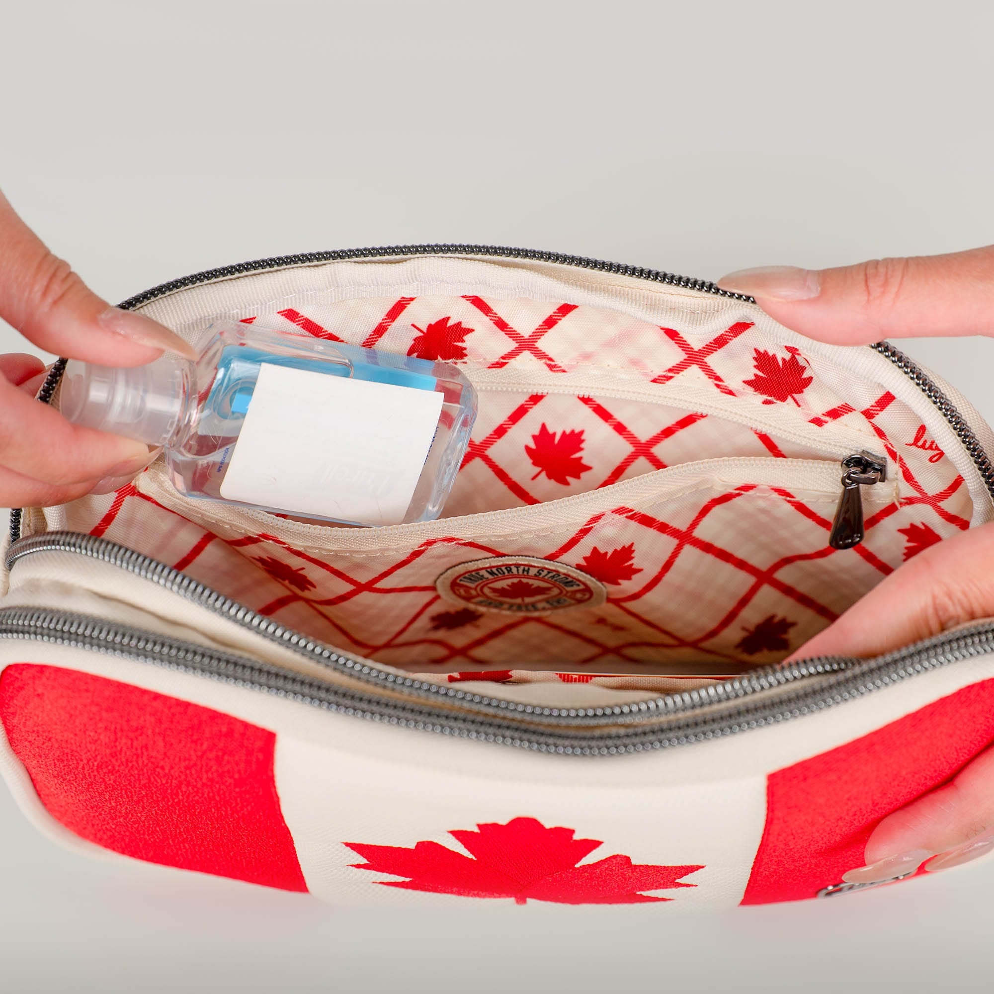 Maple Leaf Edition Coupe XL Matte Luxe VL Crossbody - - 26682_CoupeXLMatteLuxeFlag_CanadaMacadamia_Lifestyle_06