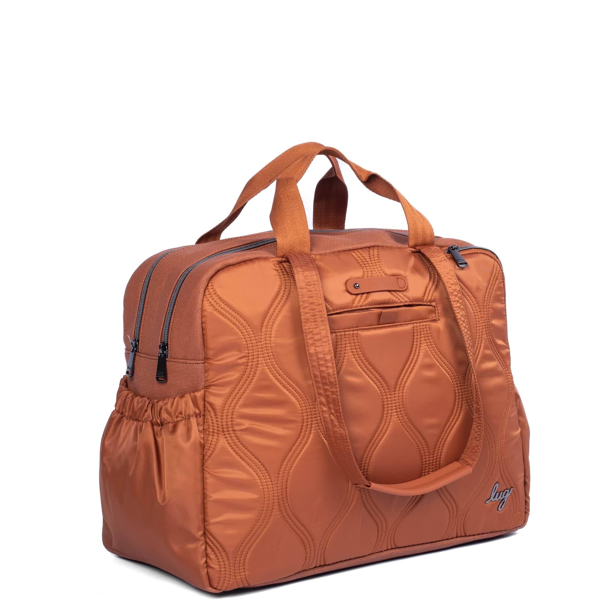 Lug Aviator Carry-All Tote Bag in copper with spacious design, sturdy handles, and multiple compartments for versatile carrying.