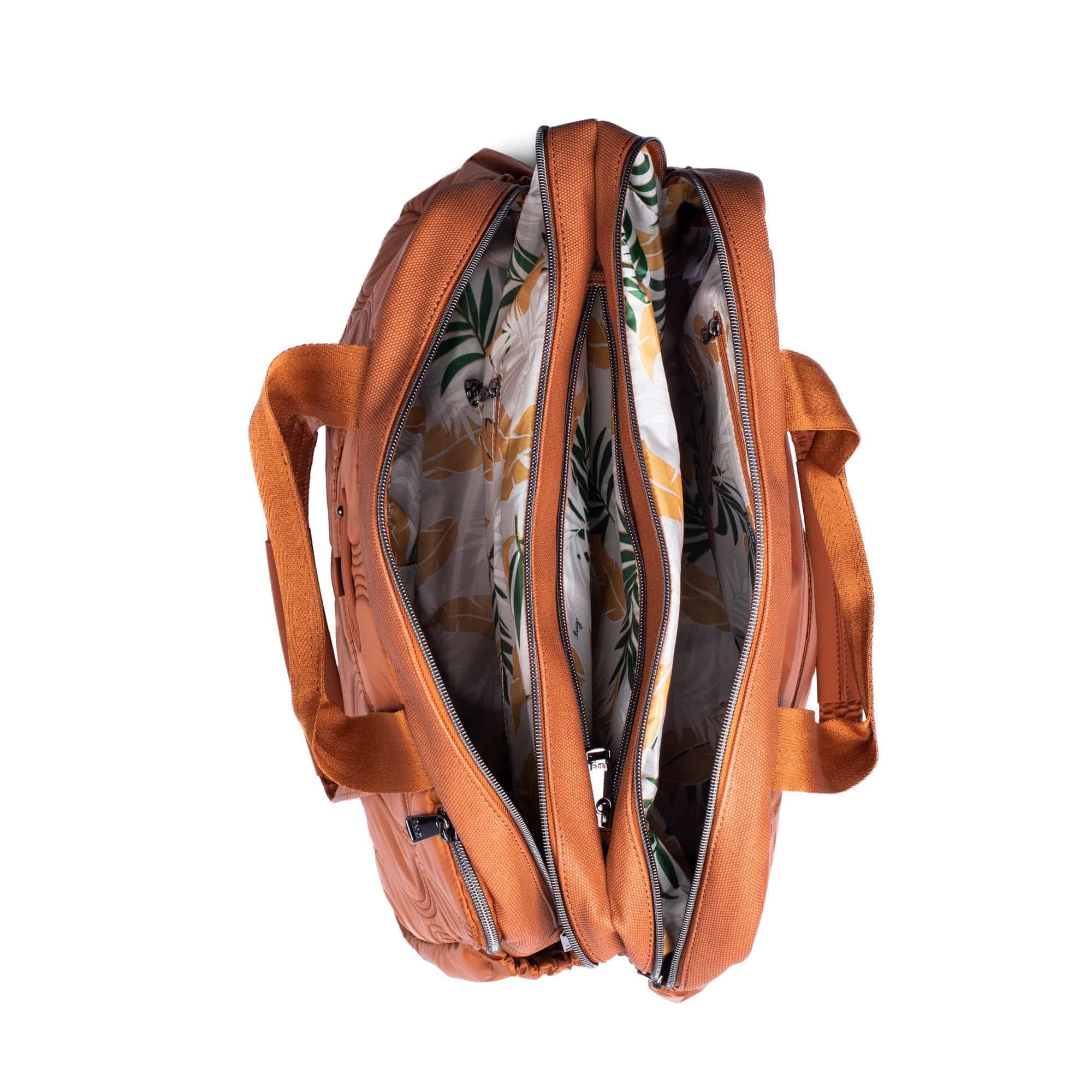 Lug Aviator Carry-All Tote Bag in copper color with multiple compartments and sturdy handles for everyday use.