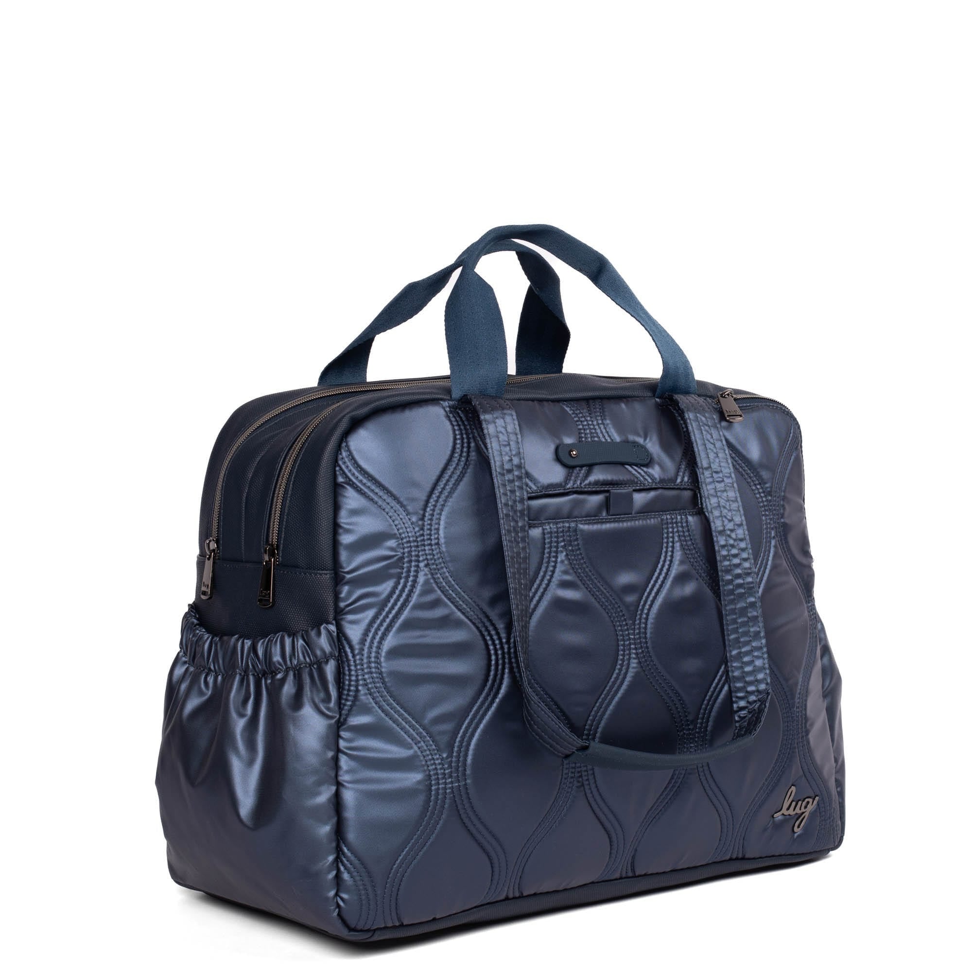Lug Aviator Metallic Indigo tote bag with sturdy handles and spacious interior, ideal for carrying everyday essentials.