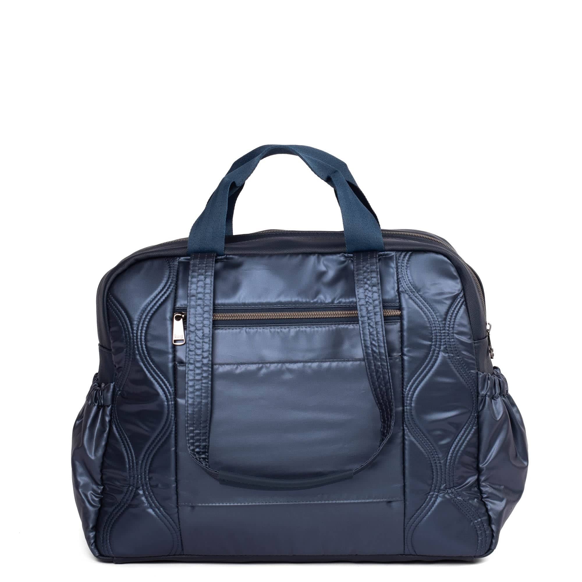 Lug Aviator metallic indigo tote bag with sturdy handles and spacious interior for everyday carry.