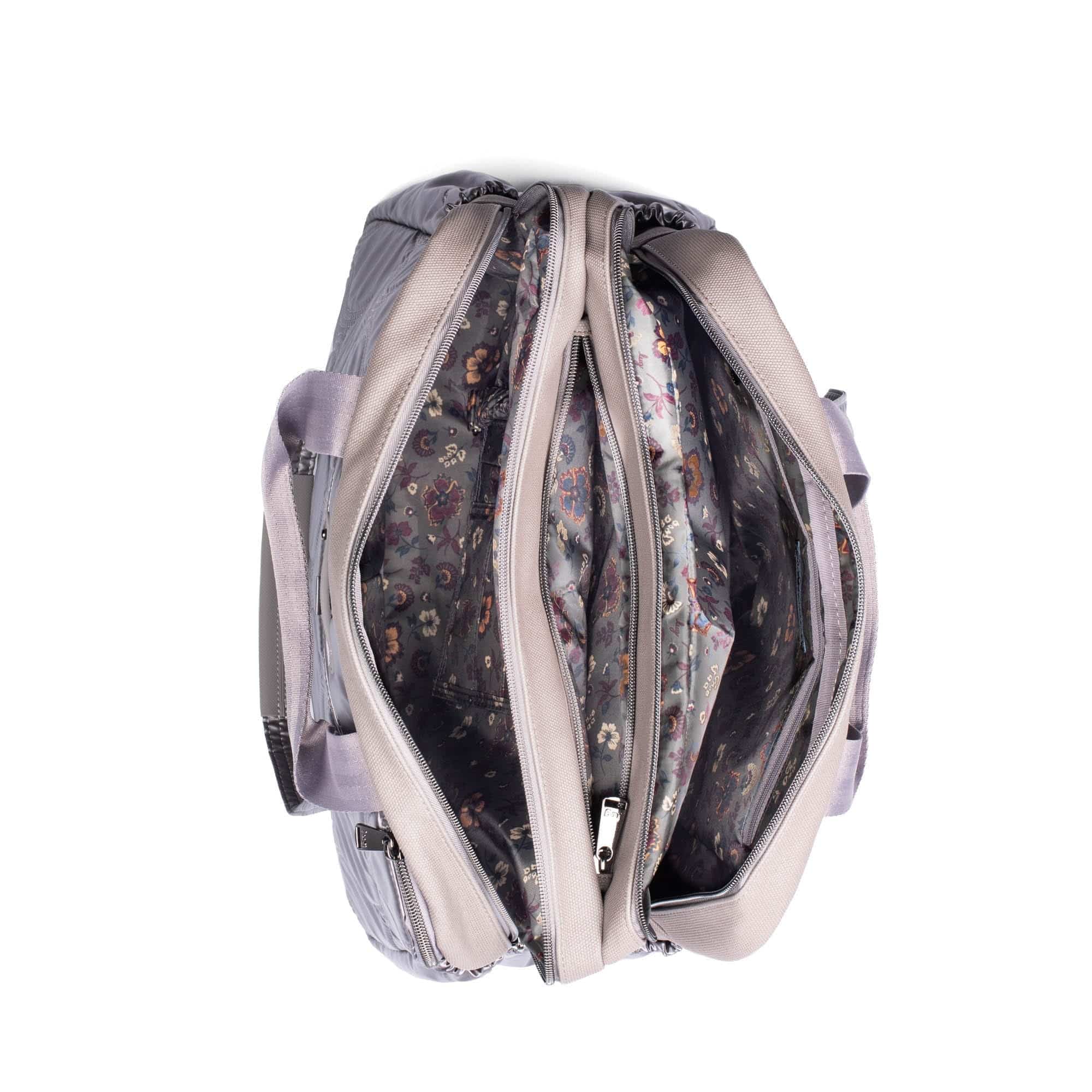 Lug Aviator Metallic Pearl tote bag with sleek design and structured shape, featuring metallic finish and sturdy handles.