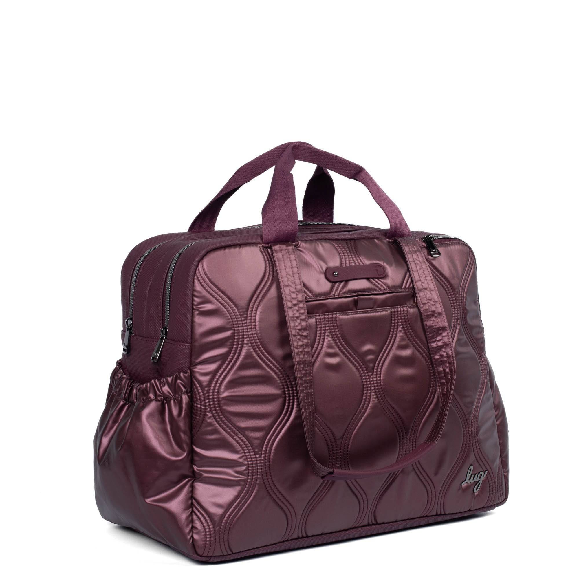 Lug Aviator Carry-All Tote Bag in metallic wine color with sturdy handles and spacious interior, ideal for everyday use.