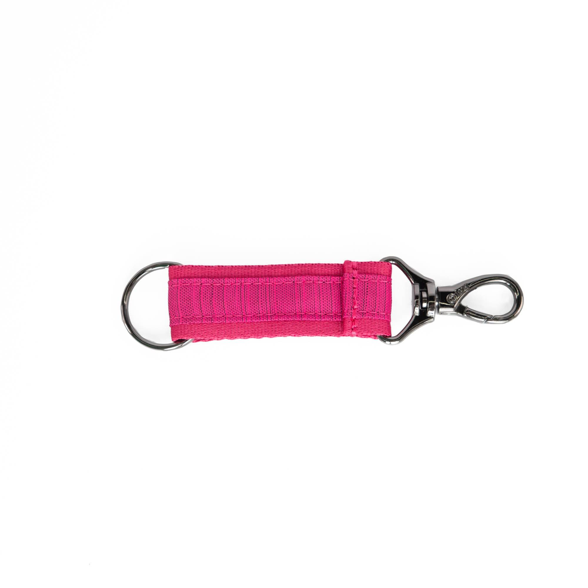 Brushed rosé pink Lug Link key chain accessory with a sleek, modern design and keyring attachment.