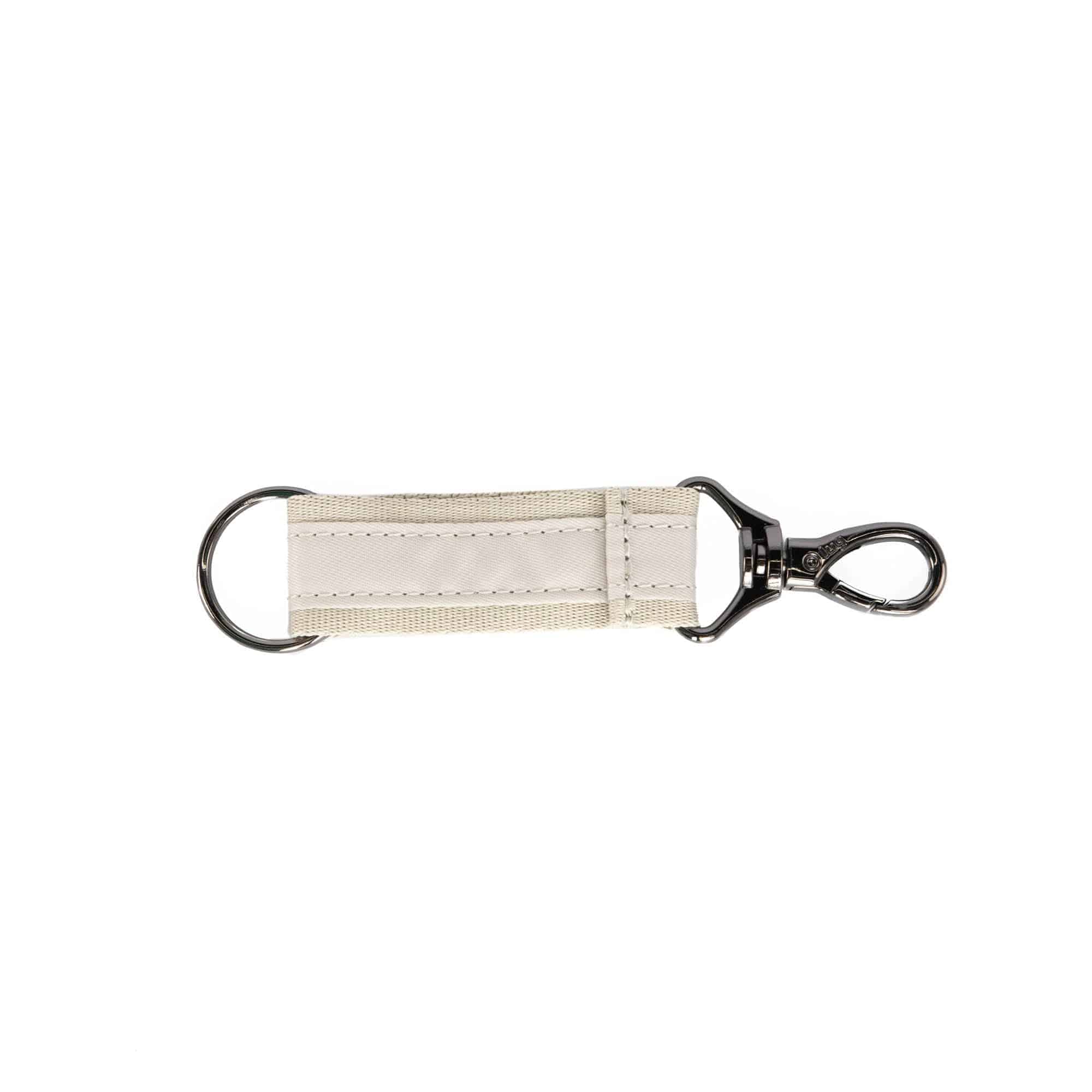 Lug Link Key Chain accessory with pebble design, featuring a durable metal key fob with textured surface.