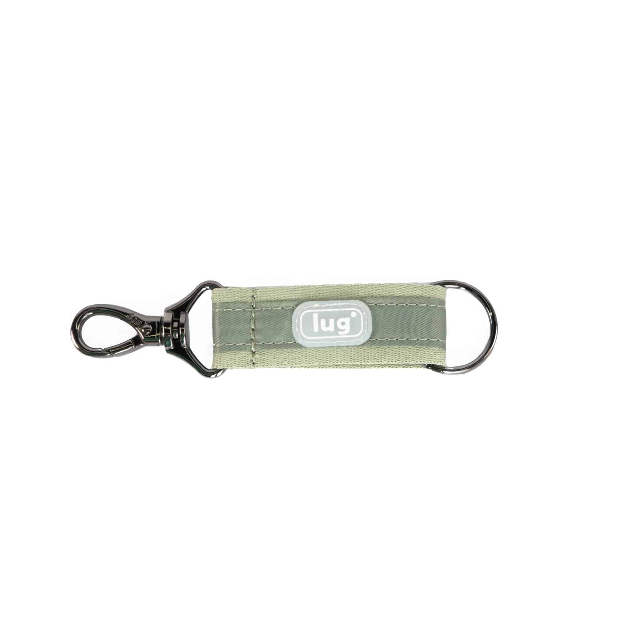Sage green Lug Link key chain accessory with a sleek, minimalist design, attached to keys or bag for stylish organization.