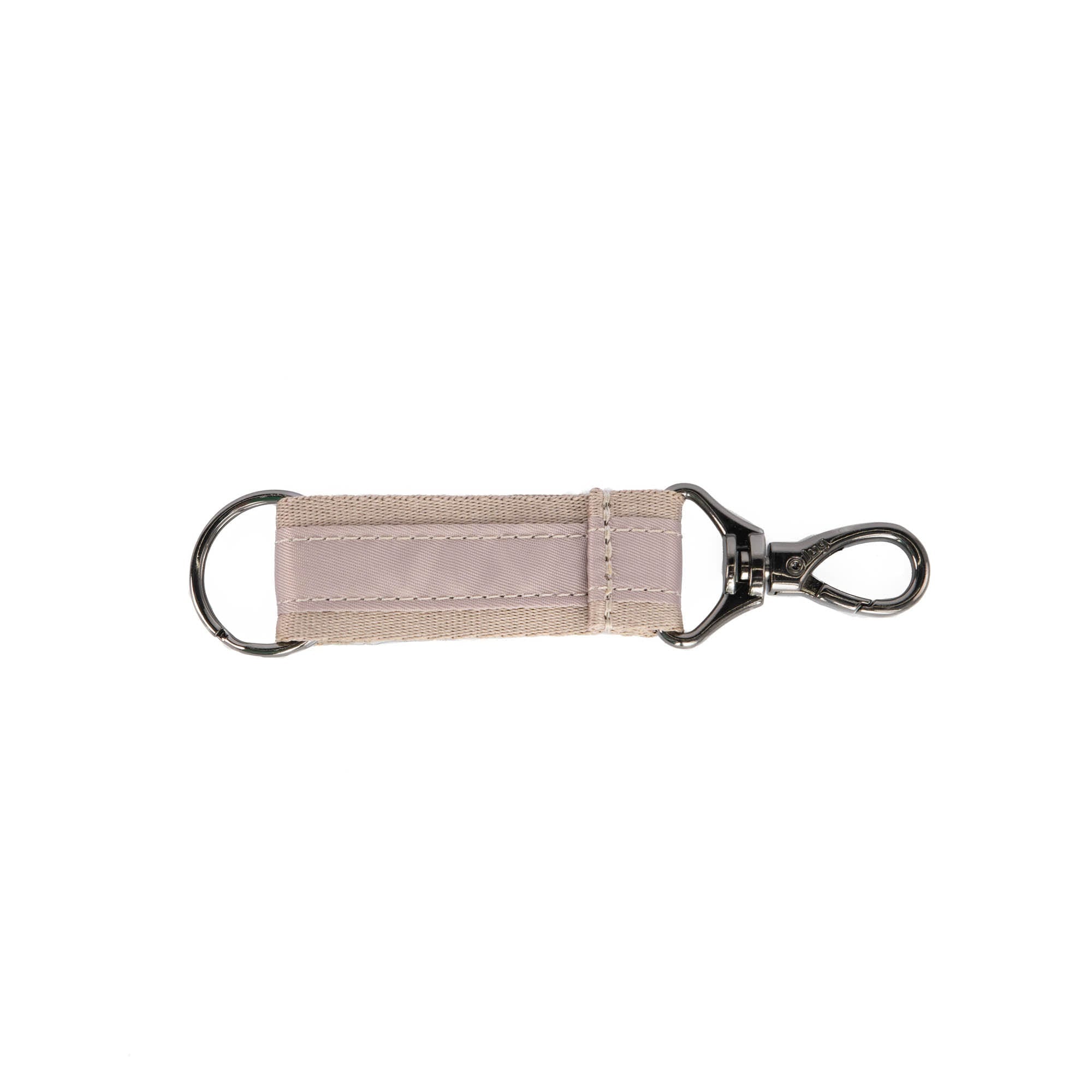 Lug Link key chain accessory with a sandy-colored key fob, featuring a durable design and metal keyring.