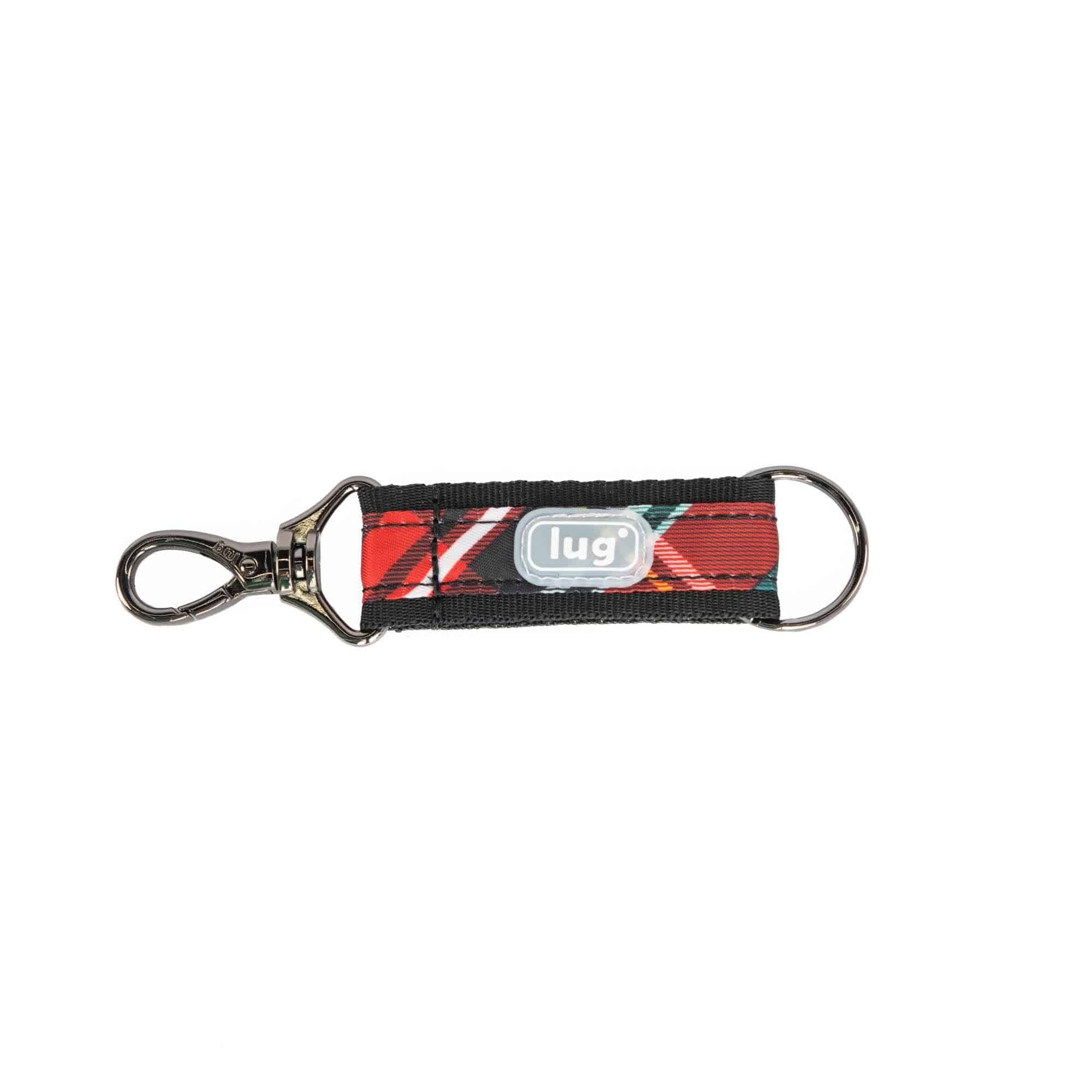 Lug tartan plaid key fob key chain accessory with woven fabric design and metal keyring attachment.