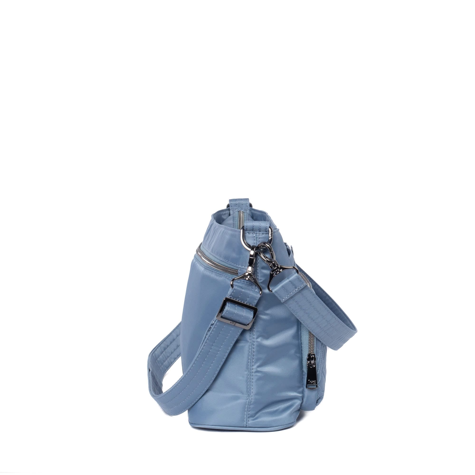 Lug Samba 2 Blue Moon convertible crossbody bag with adjustable strap and multiple compartments, made of durable fabric.