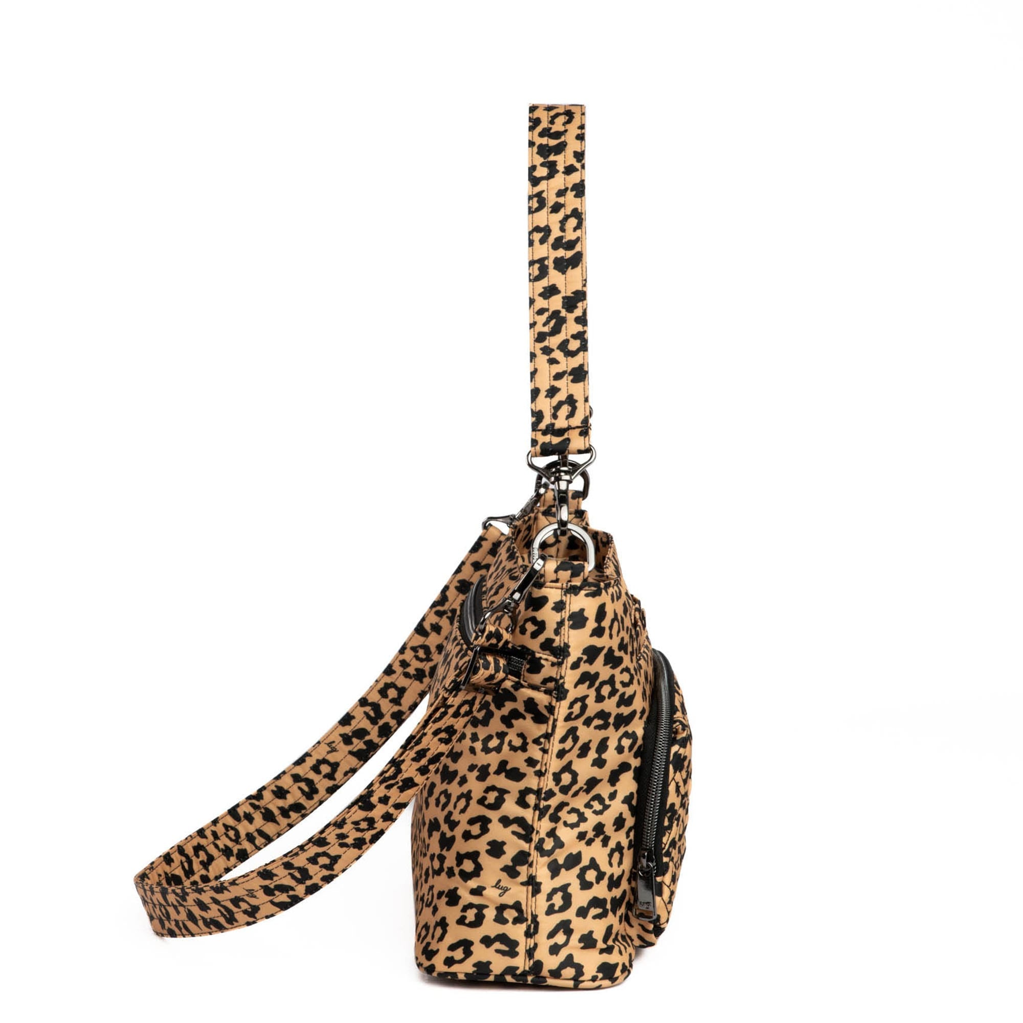 Lug Samba 2 convertible crossbody bag in spotted leopard print with adjustable strap and compact design.