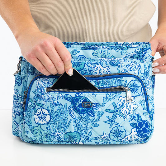 Shimmy SE Crossbody Bag - - ShimmySE_Lifestyle_01_50927887-7579-4096-9afd-89b44372670b