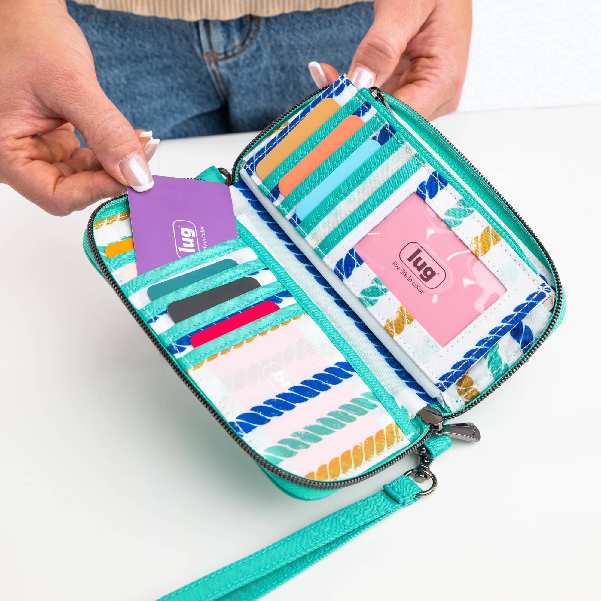Whirly RFID Wristlet Wallet - - Whirly_Lifestyle_01_763f4654-3b97-477f-9585-ec19641d6f6b