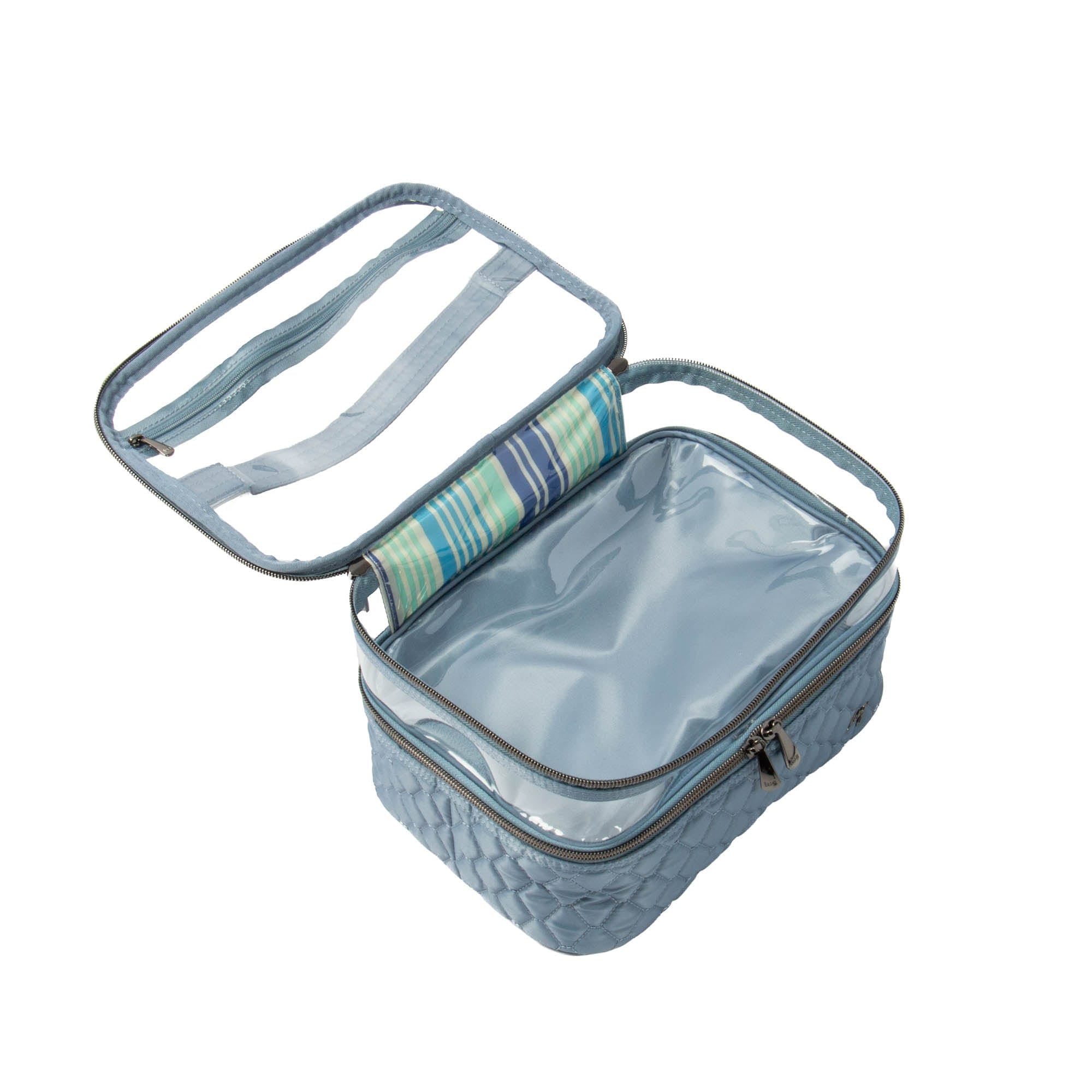 Blue Moon Lug Whoosh Clearview cosmetic case open with makeup brushes and skincare products inside.