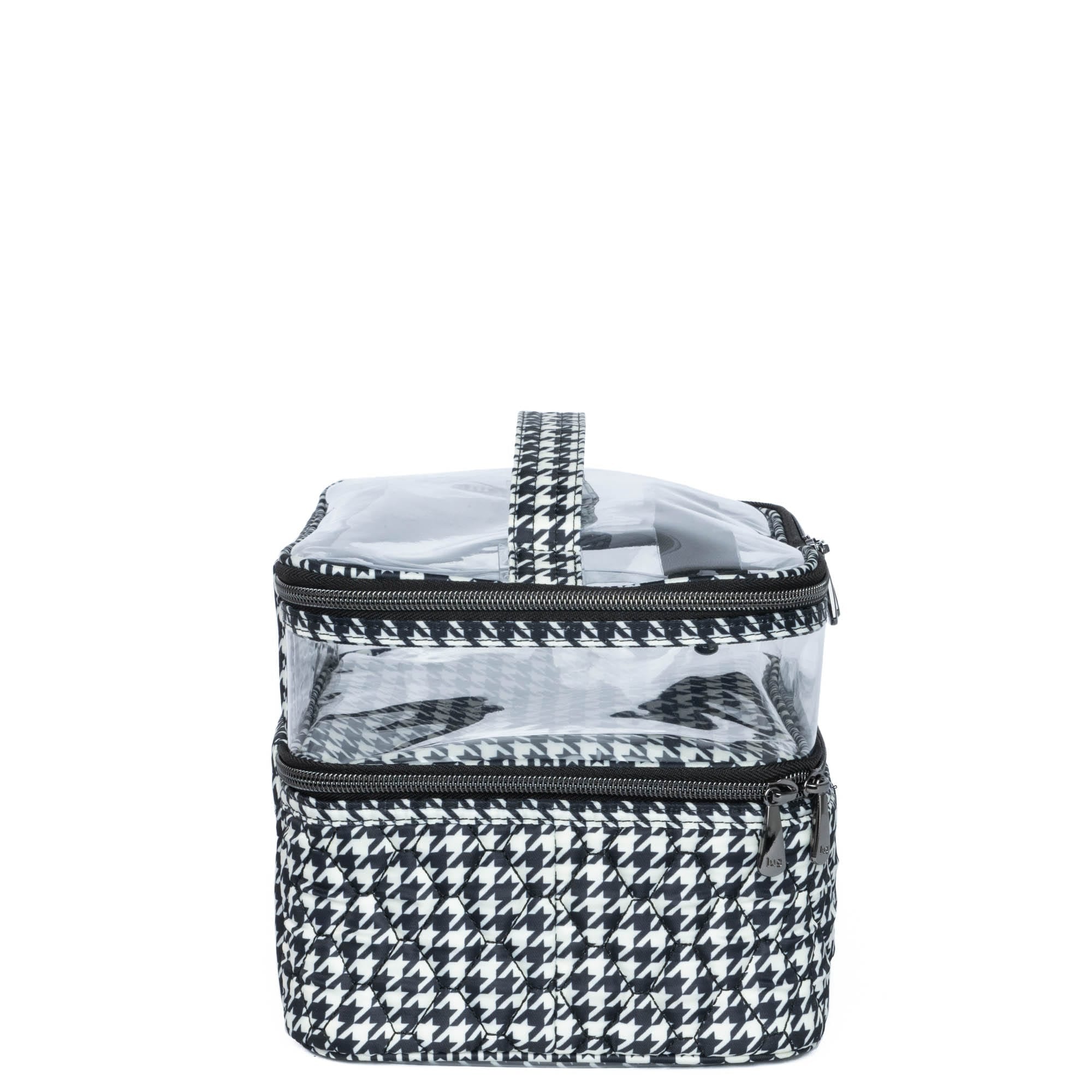 Lug Whoosh Clearview cosmetic case with houndstooth pattern, transparent front and black zipper for easy makeup storage.