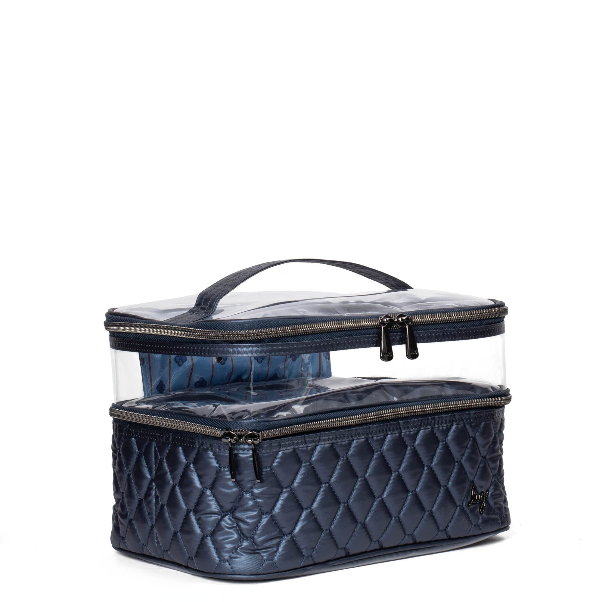 Metallic indigo Whoosh Clearview cosmetic case by Lug with transparent compartments and zipper closure, designed for organizing makeup.