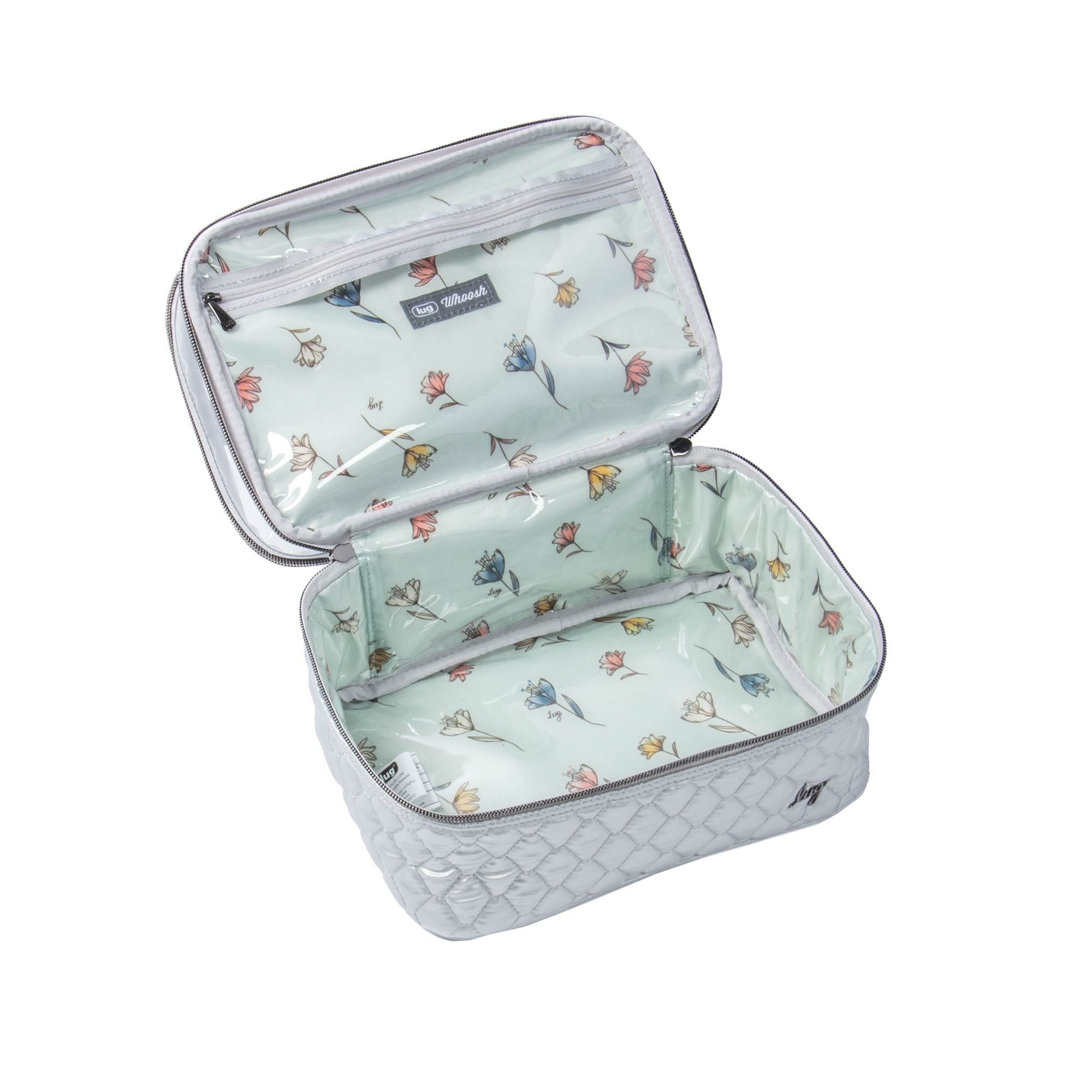 Metallic silver Whoosh Clearview cosmetic case by Lug with transparent design and multiple compartments for makeup storage.