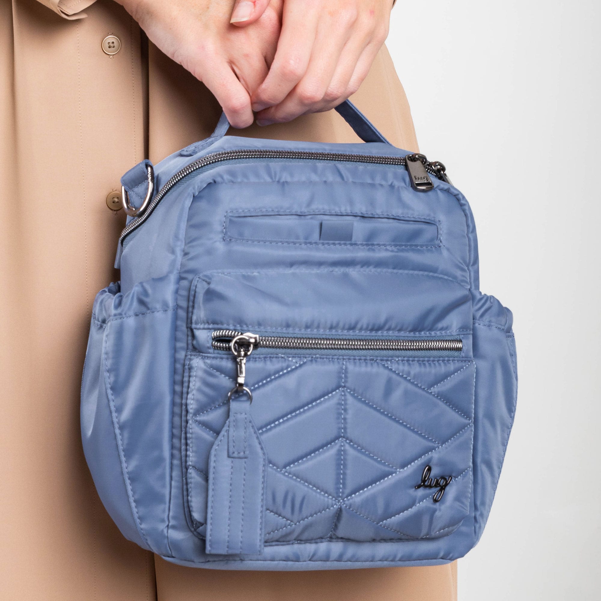 Alpine Crossbody Bag - BLUE MOON ICEPOP - Alpine_Lifestyle_01_1b26f955-4835-42ed-a313-fed592ae2b11