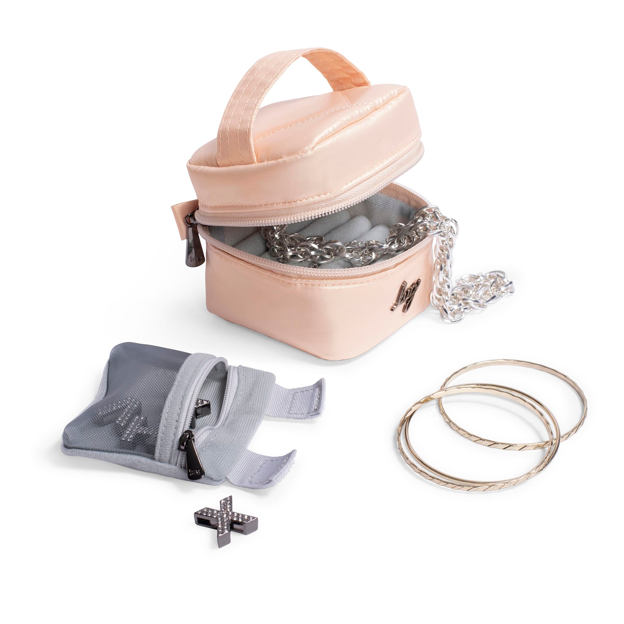 Swizzle Mini Jewelry Case - - MiniSwizzle_RoseGoldMetallic_Lifestyle_02_41bca195-6c9a-4043-b514-0c9b22f57be0