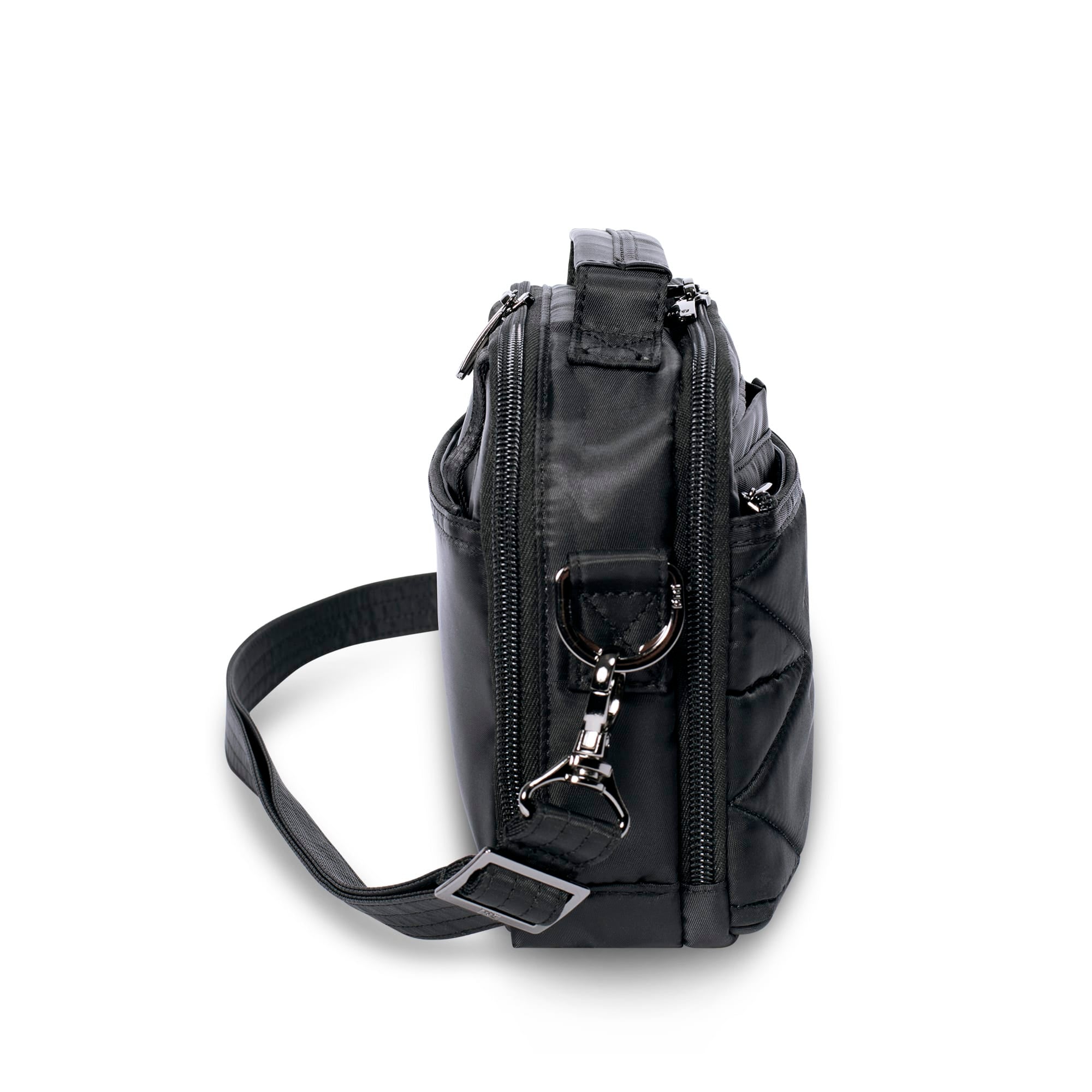 Black Lug Roundabout XL convertible crossbody wallet showing multiple compartments and adjustable strap on a white background.