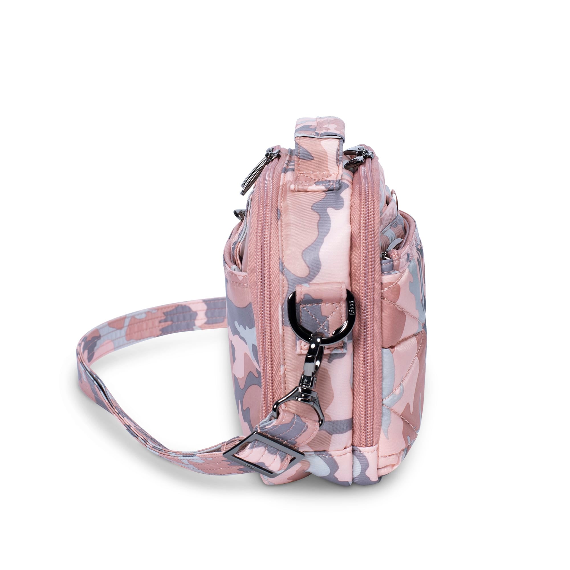 Lug Roundabout XL convertible wallet crossbody in camo rose pattern, featuring multiple compartments and adjustable strap.