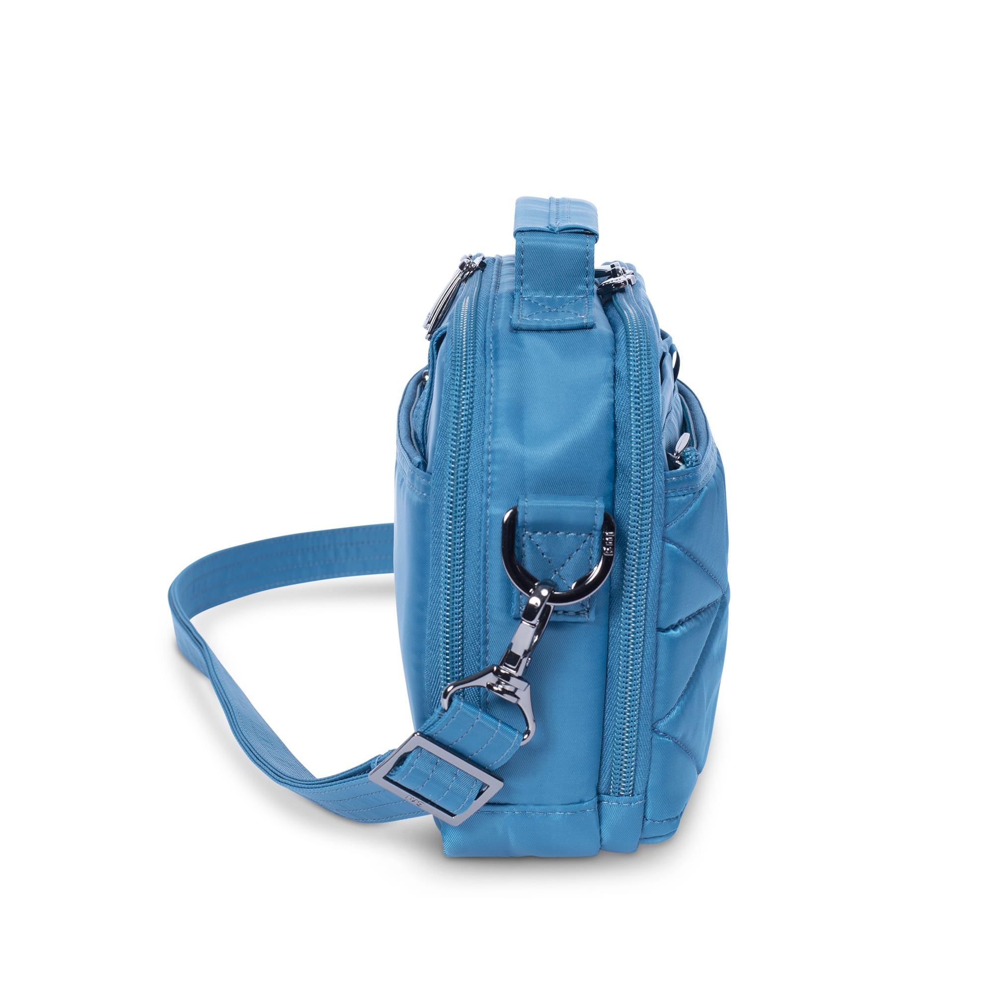 Lug Roundabout XL convertible crossbody wallet in ocean blue with multiple compartments and adjustable strap.