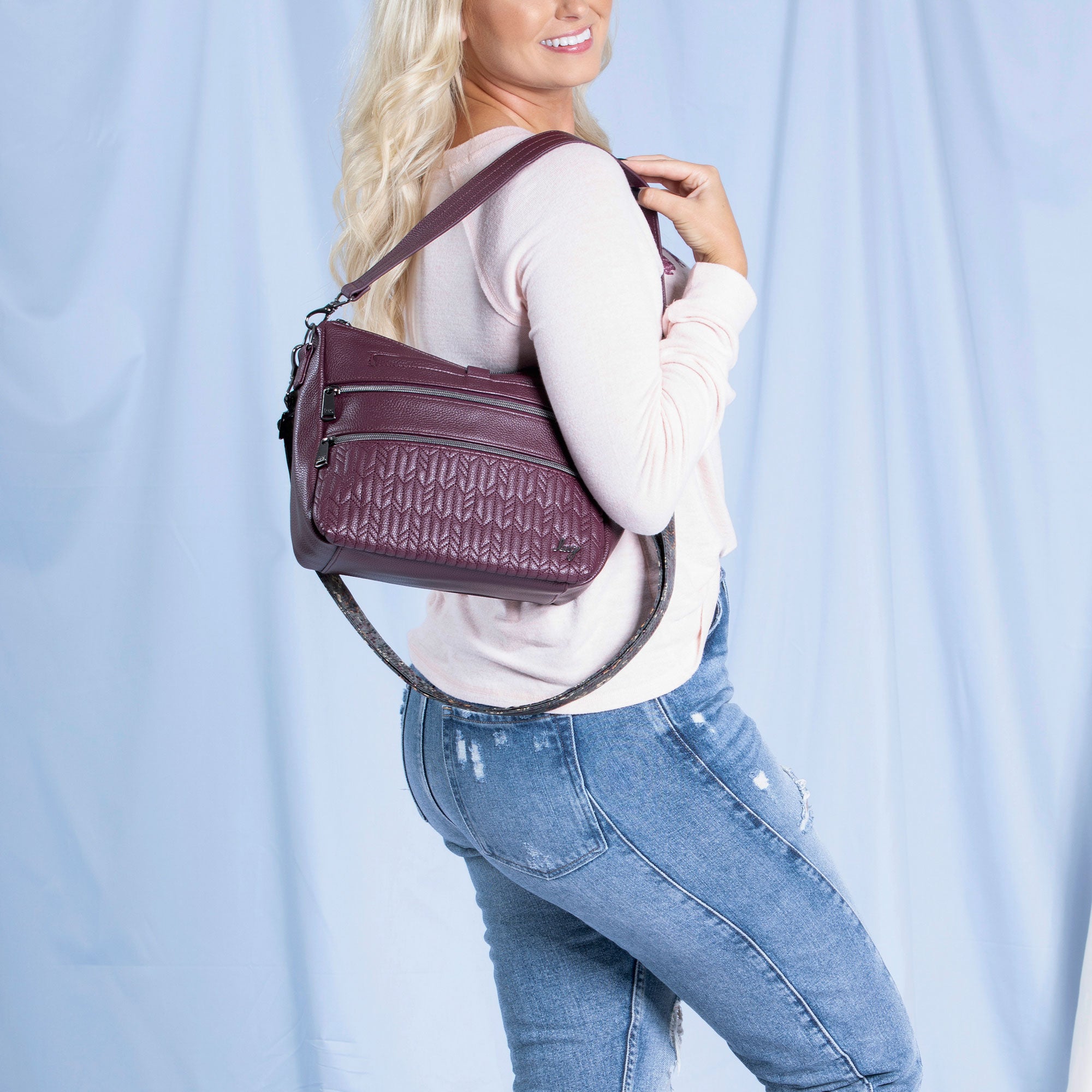 Lug Slider Classic VL Crossbody Bag in sleek design, featuring adjustable strap and multiple compartments for everyday use.